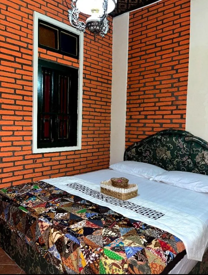Bed in Kampoeng Djawa Hotel