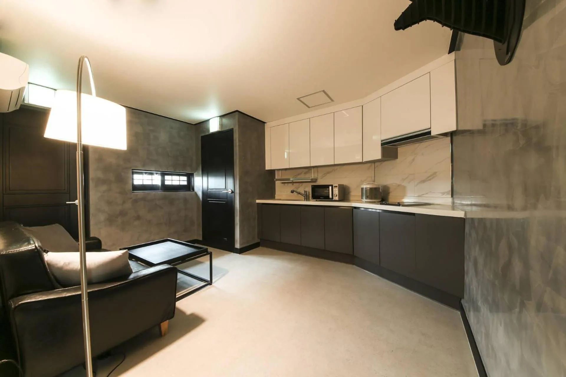 Kitchen/Kitchenette in almond hotel Gupo station