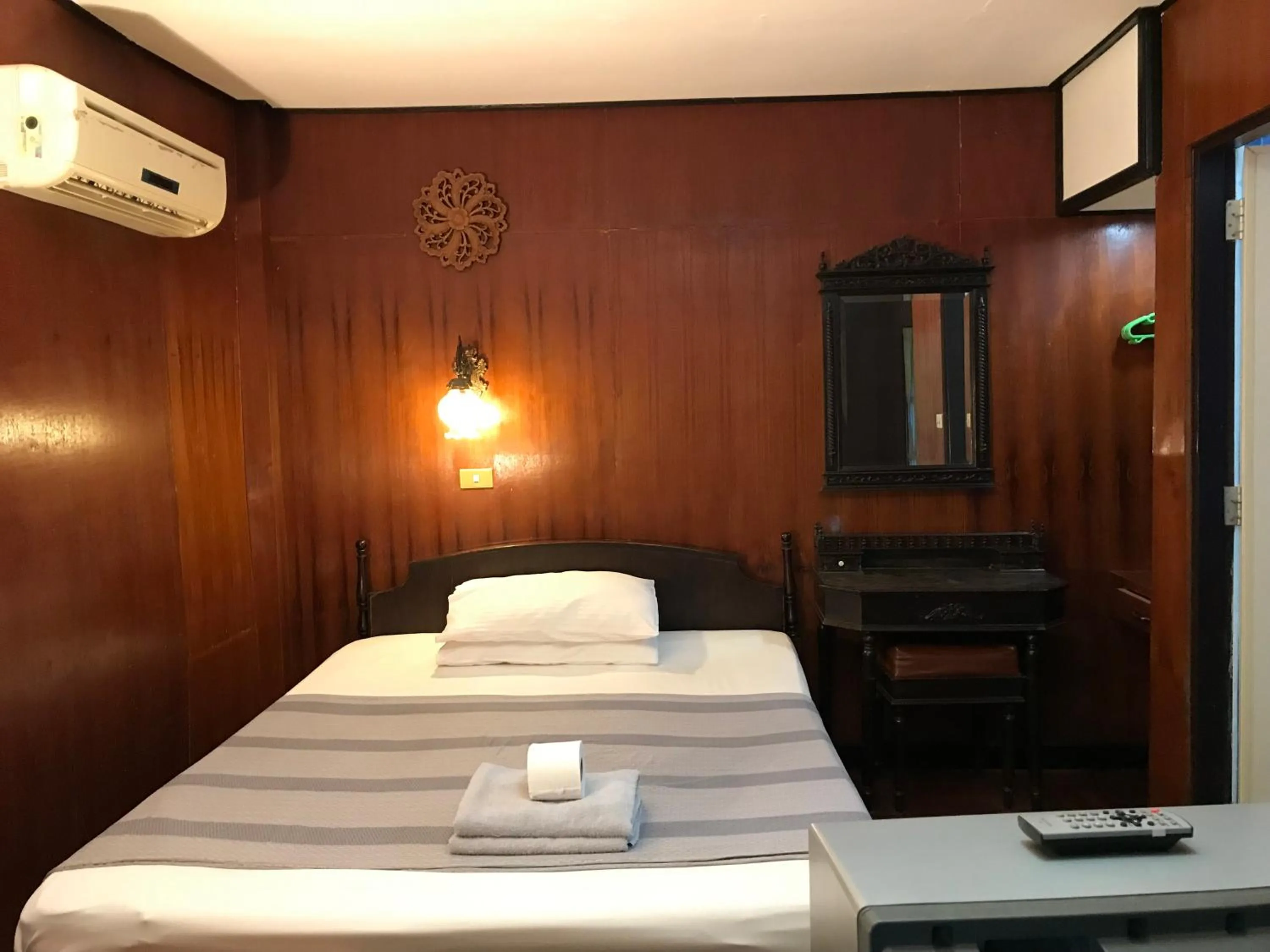 Bed in Sunrise Bungalow