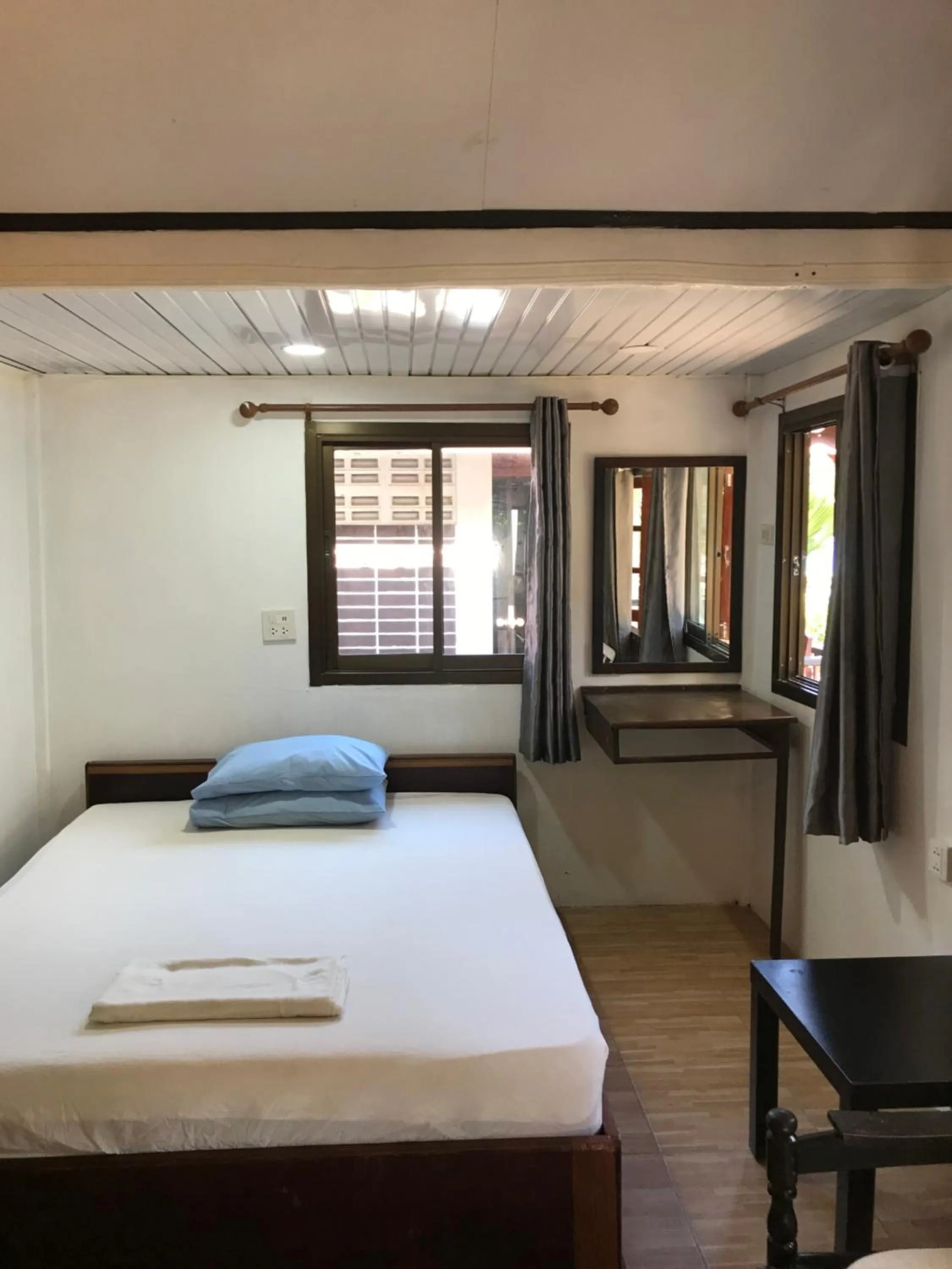 Bed in Sunrise Bungalow