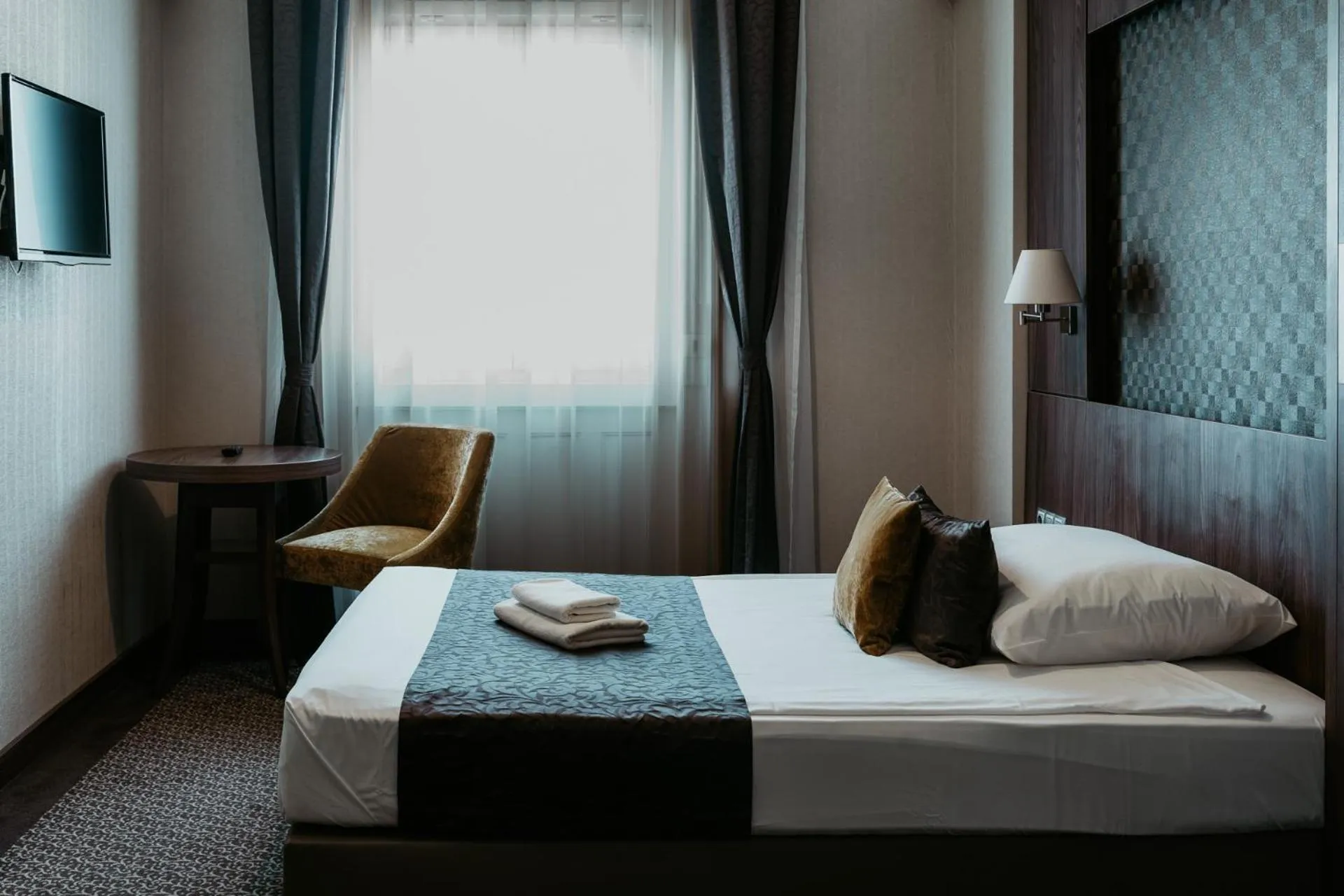 Bed in Duna Wellness Hotel