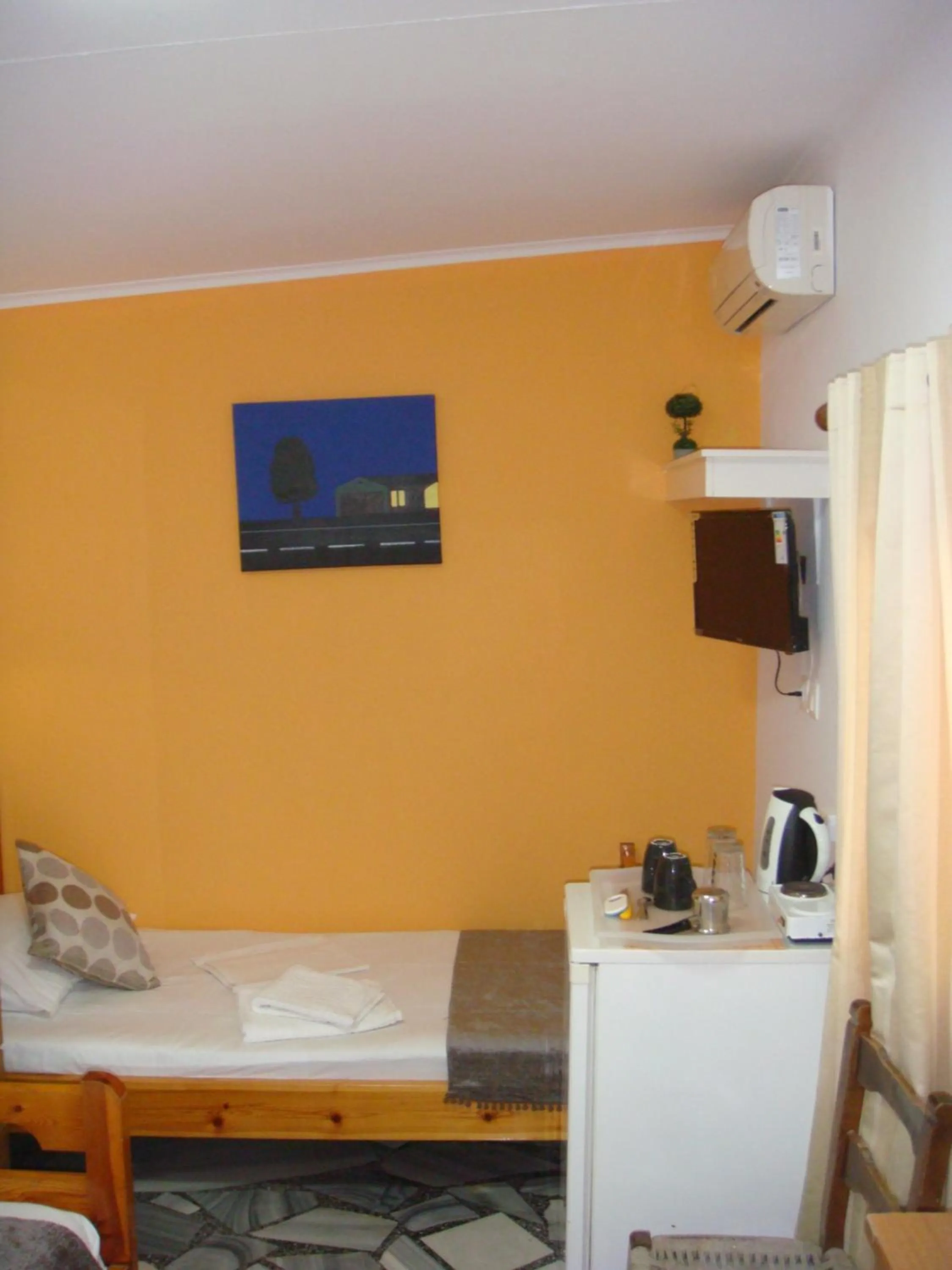 Bed in Boussetil Rooms CapAnMat