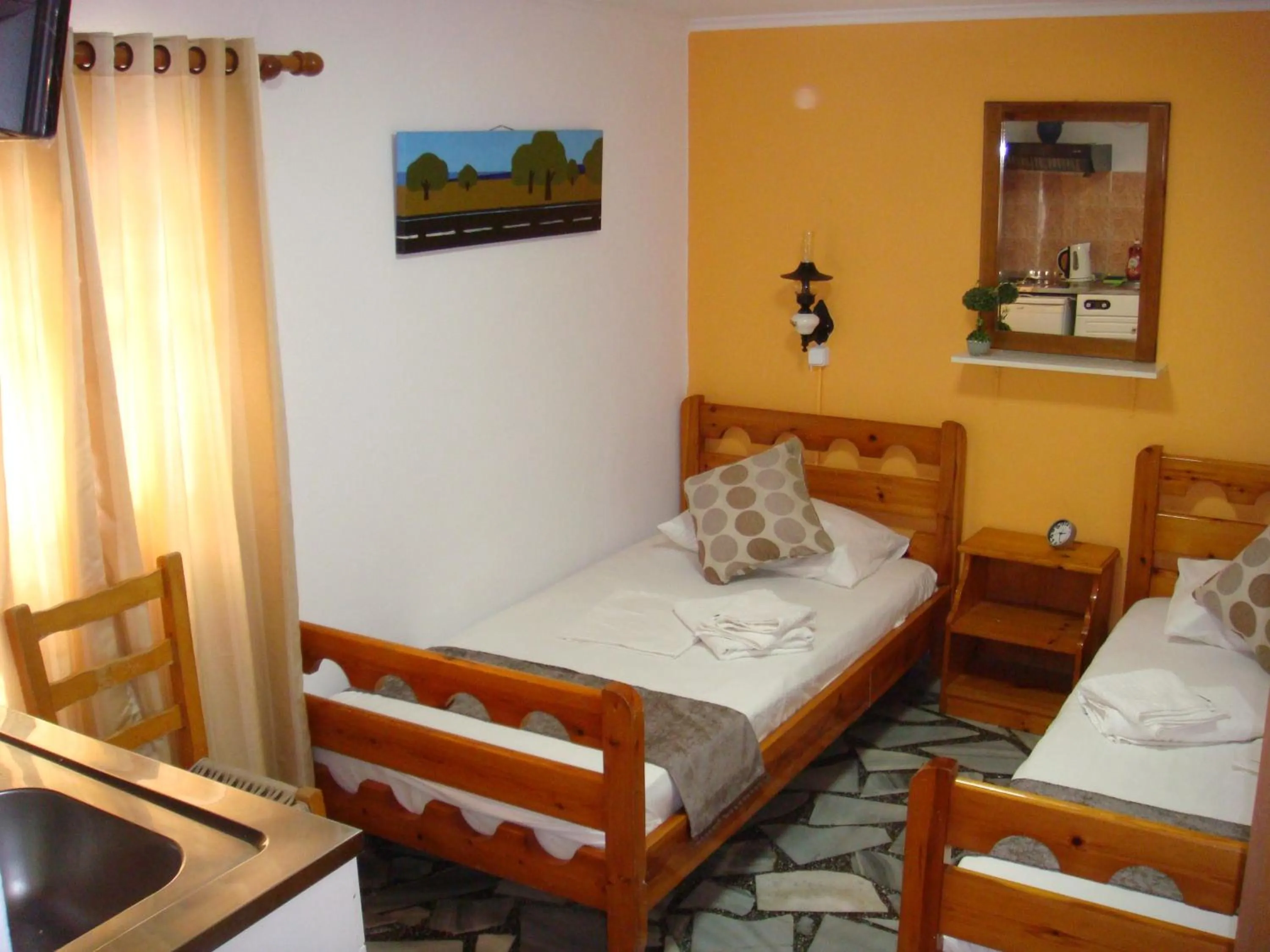 Bed in Boussetil Rooms CapAnMat