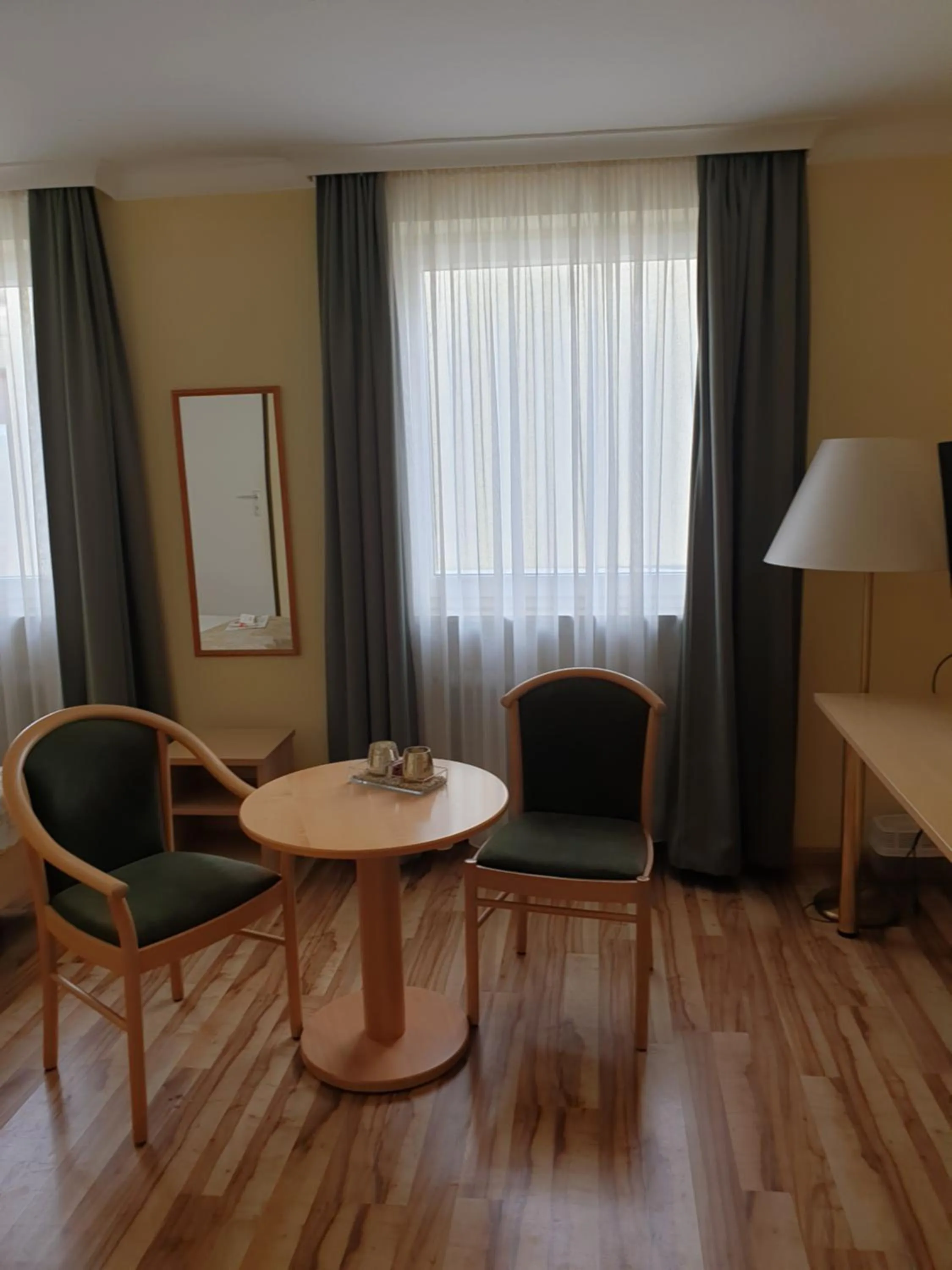 Communal lounge/ TV room in Traditionsgasthof Grüner Baum