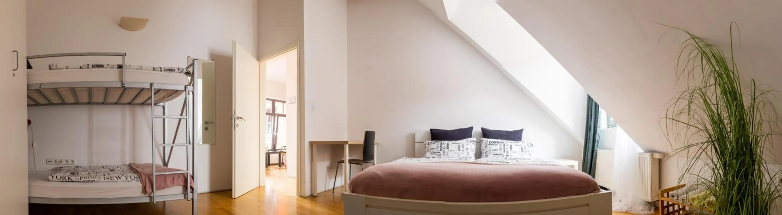 Bed in Cukrarna Guest Accommodation