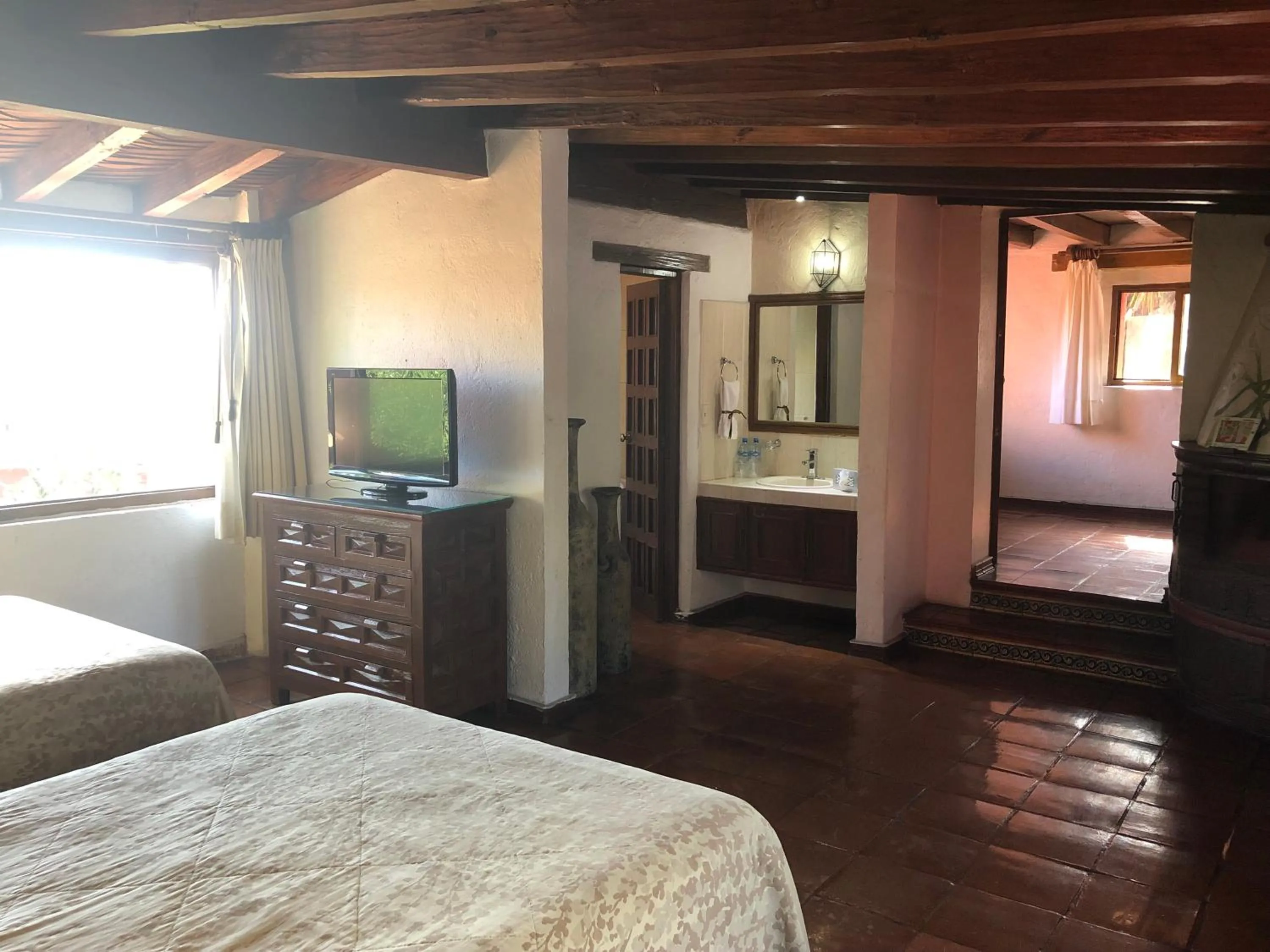 Photo of the whole room, Bed in Villa San Jose Hotel & Suites