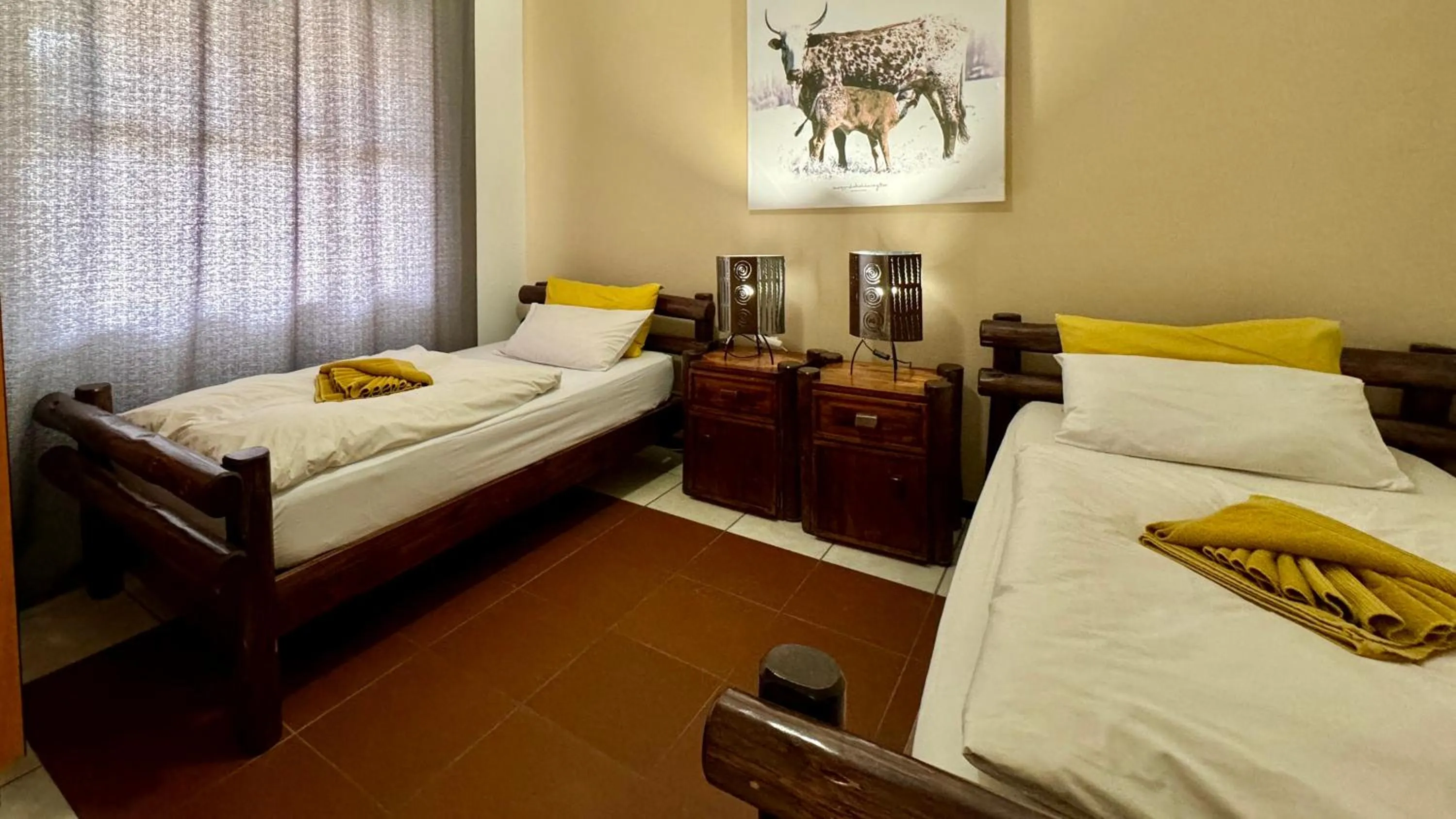 Bed in Bushbabies-Inn Self-Catering Accommodation