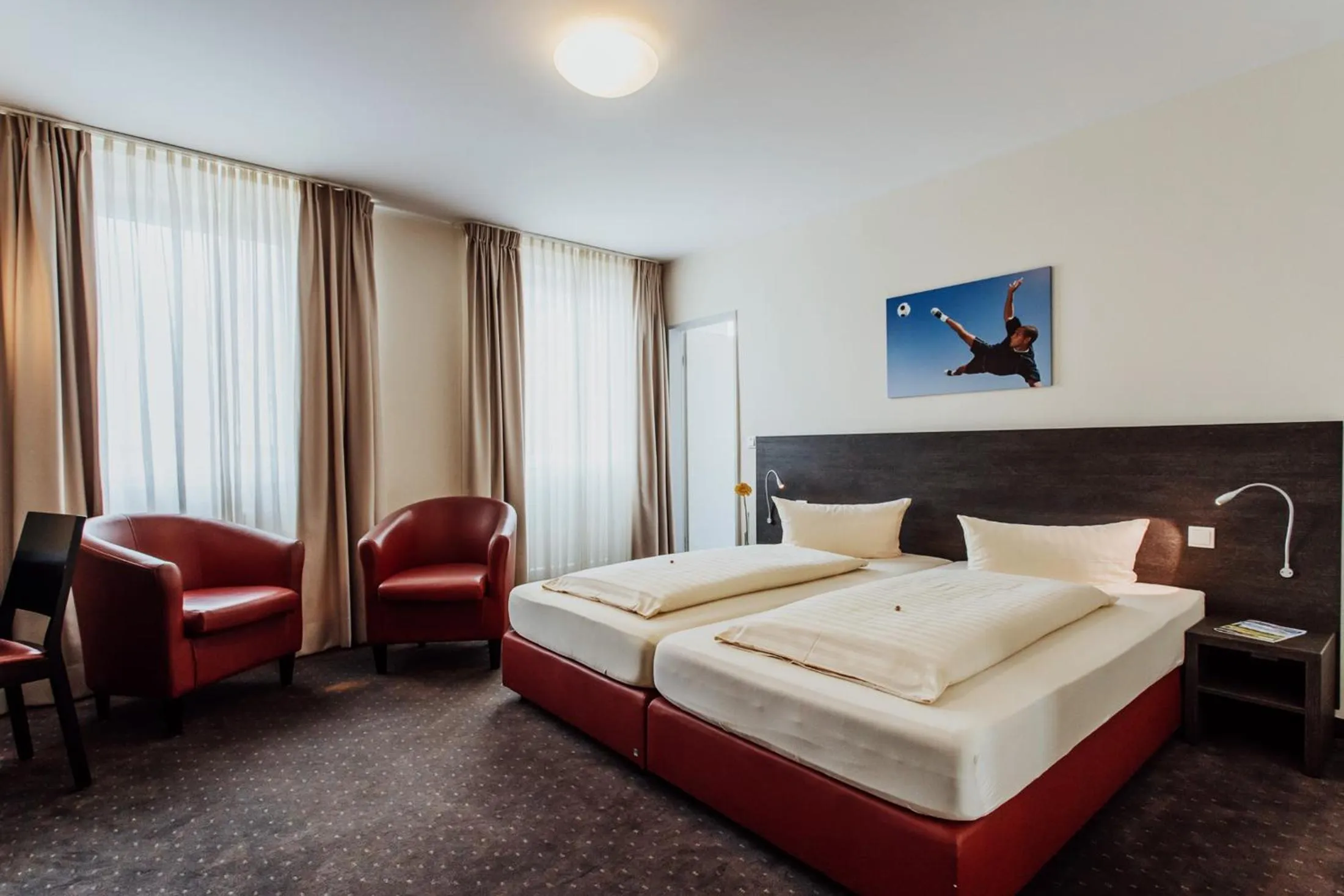 Photo of the whole room, Bed in Hotel Bloemfontein