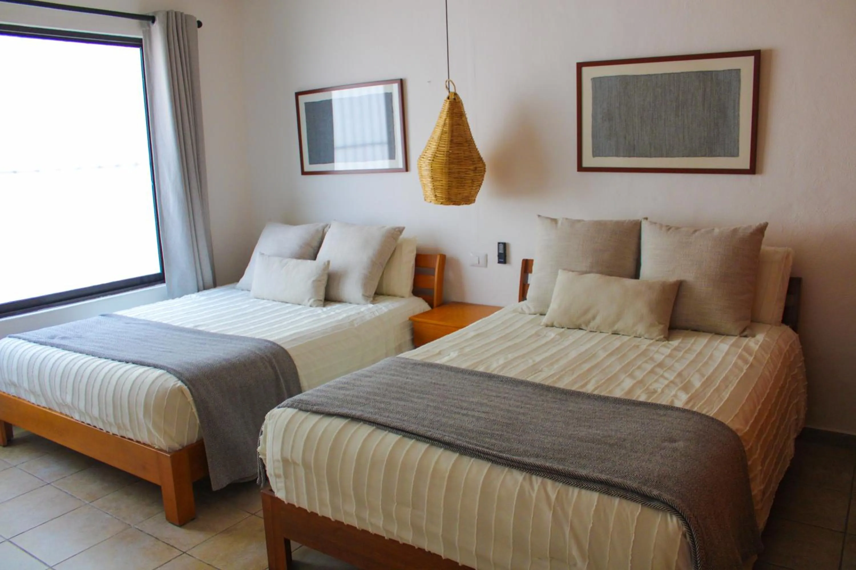 Bed in Villas Mayaluum Cozumel