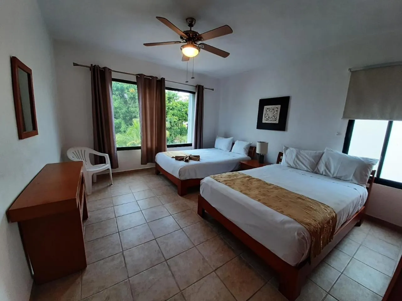 Bed in Villas Mayaluum Cozumel