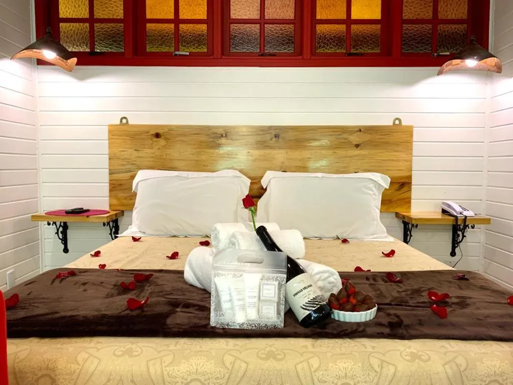 Bed in Pousada Solar D'Araucaria