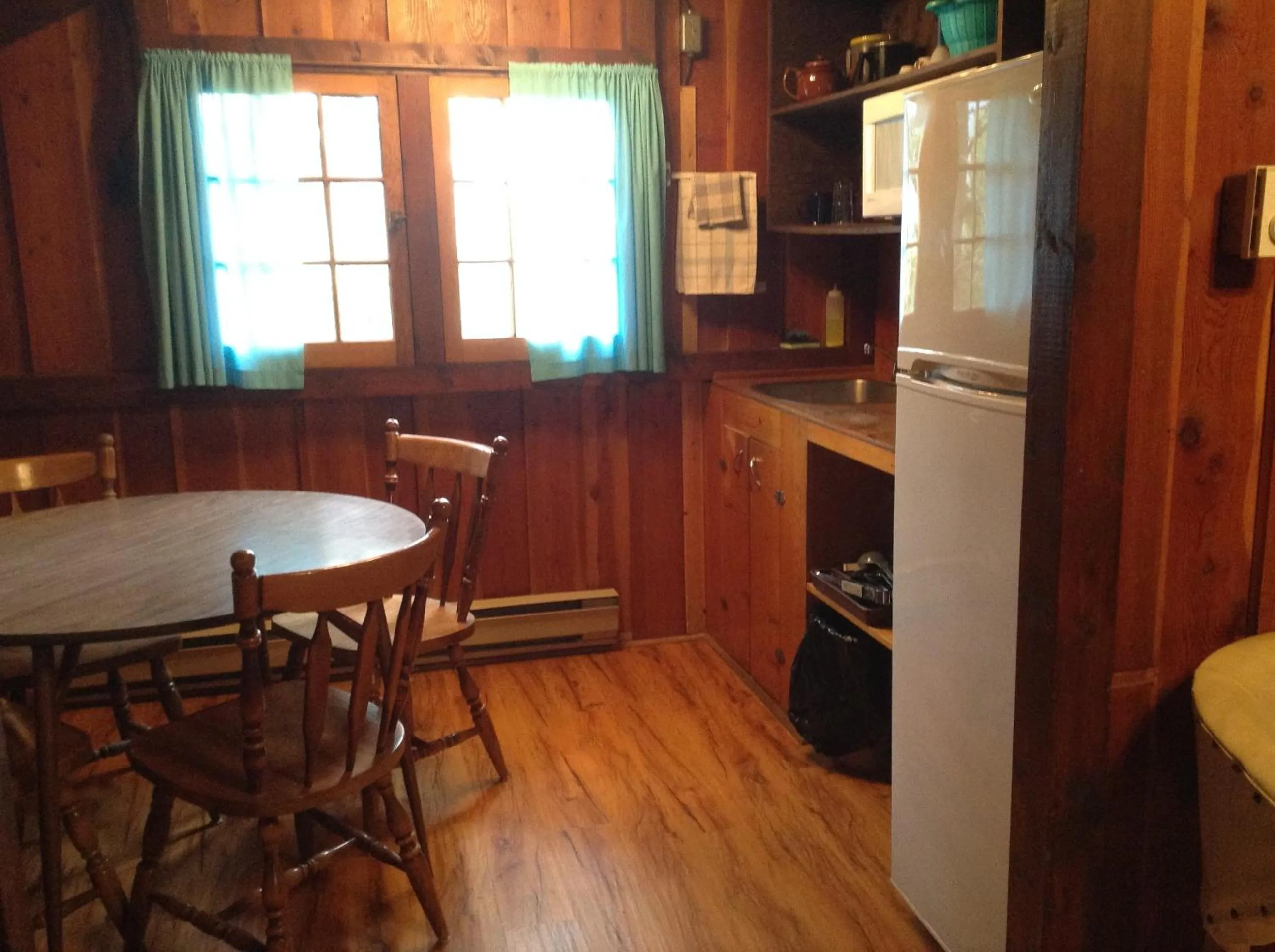 Kitchen or kitchenette in Addison's Bungalows