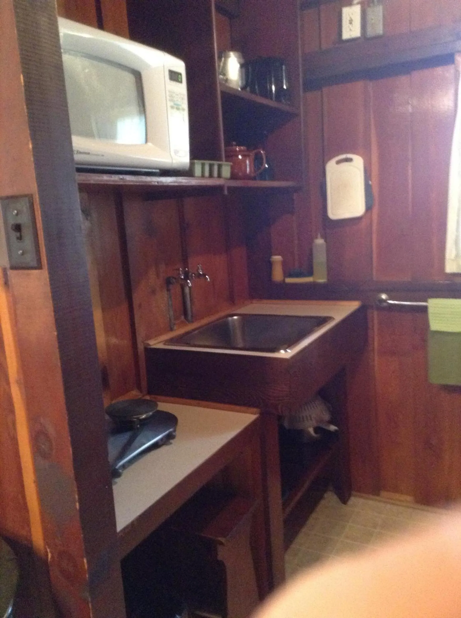 Kitchen or kitchenette in Addison's Bungalows