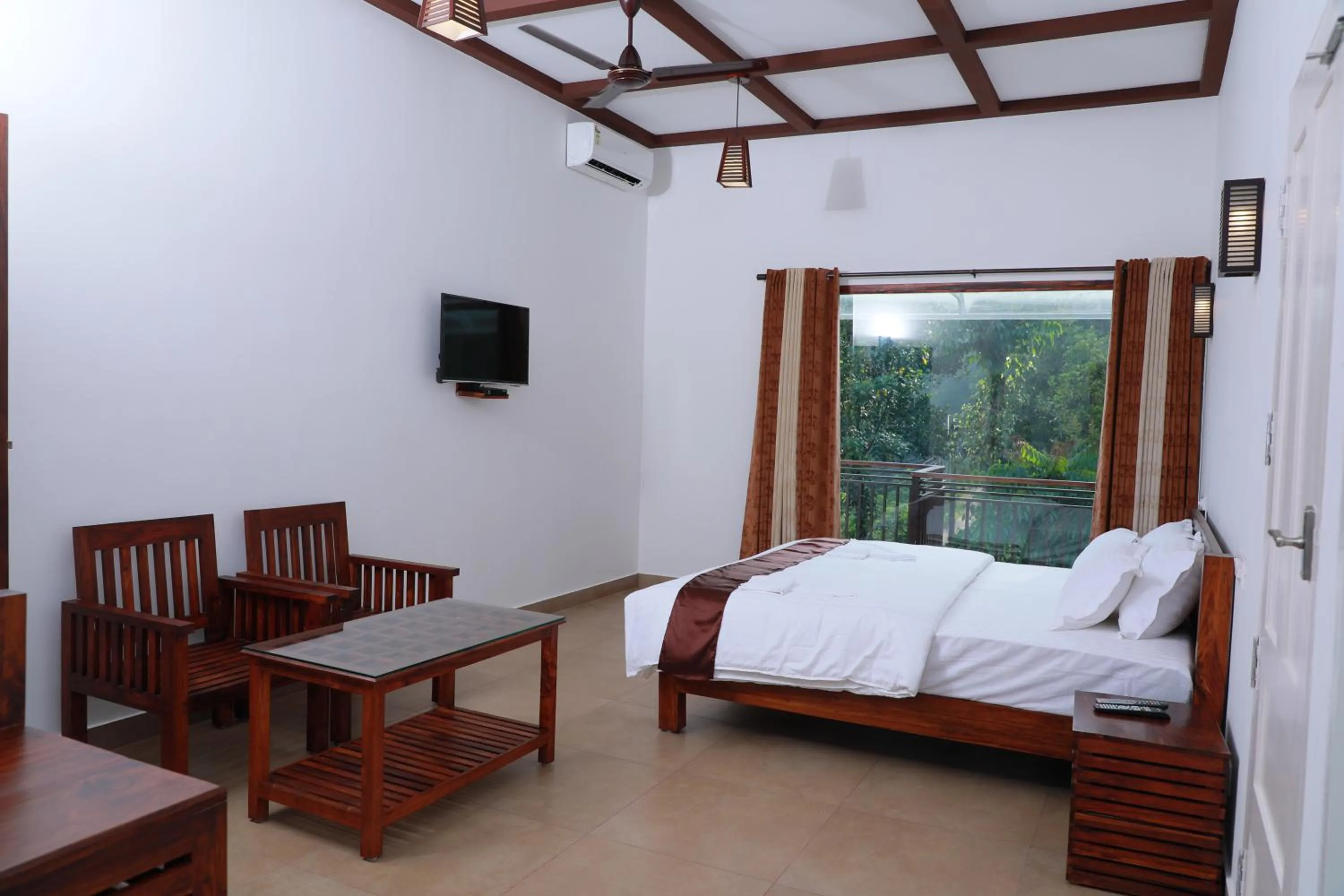 Photo of the whole room, Bed in Coffee and Pepper Plantation Homestay