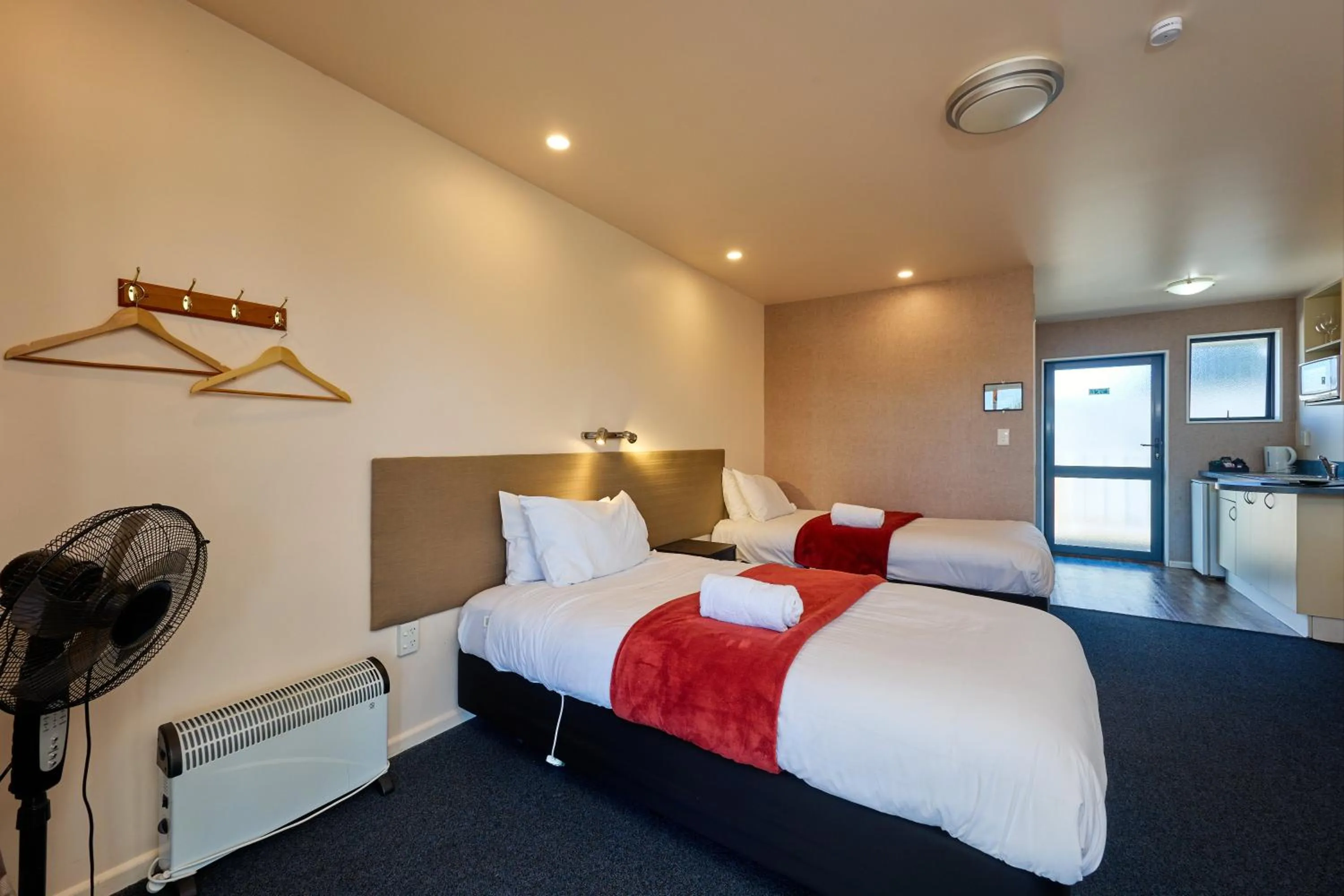 Bed in Mediterranean Motel Kaikoura