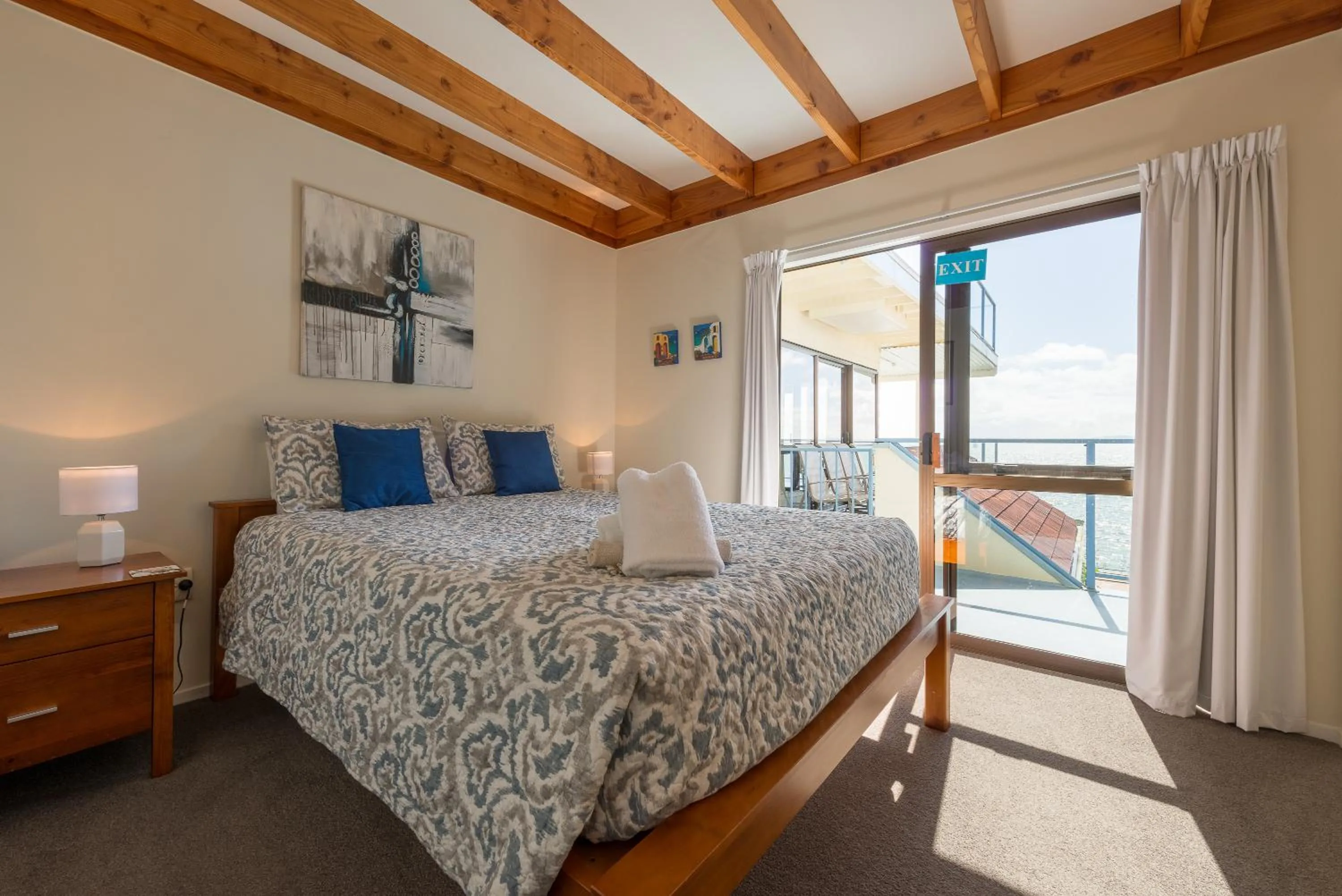 Photo of the whole room, Bed in By the Bay Beachfront Apartments