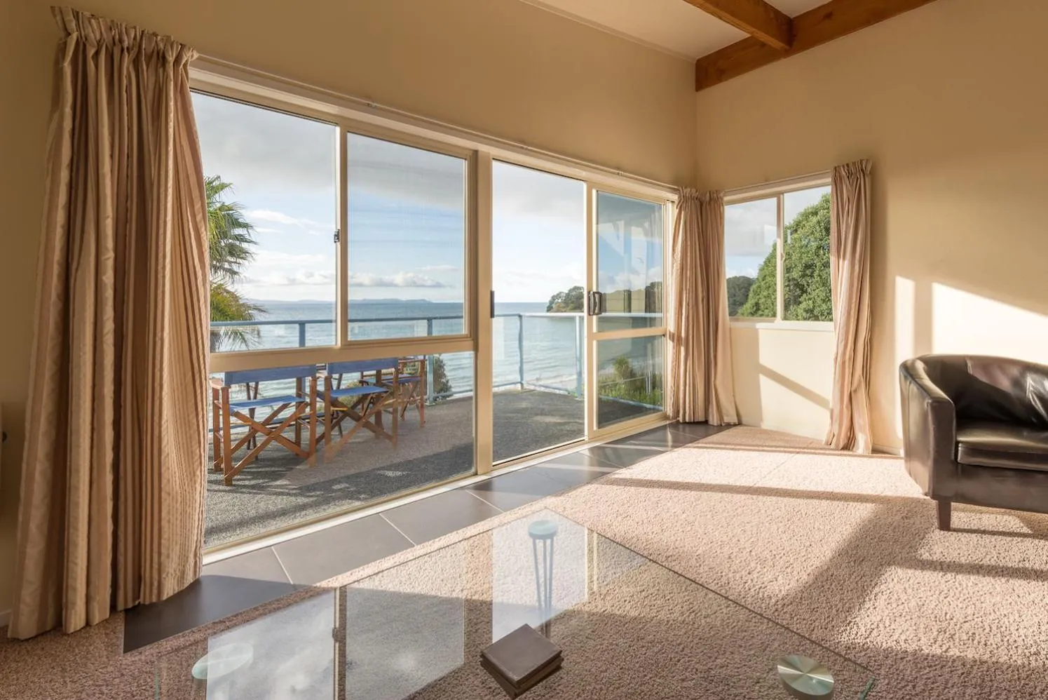 Living room in By the Bay Beachfront Apartments