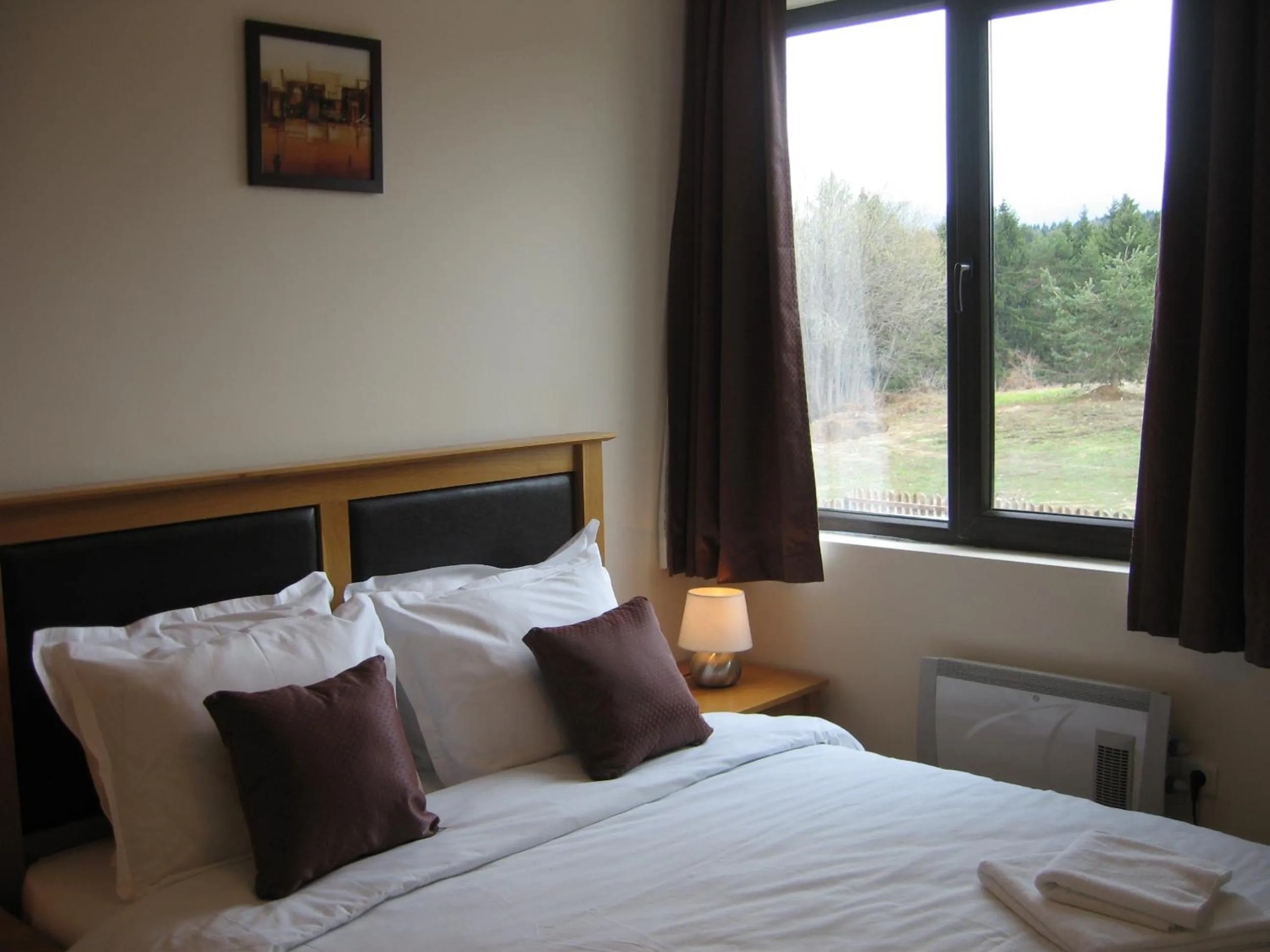 Bed in Chamkoria Chalets