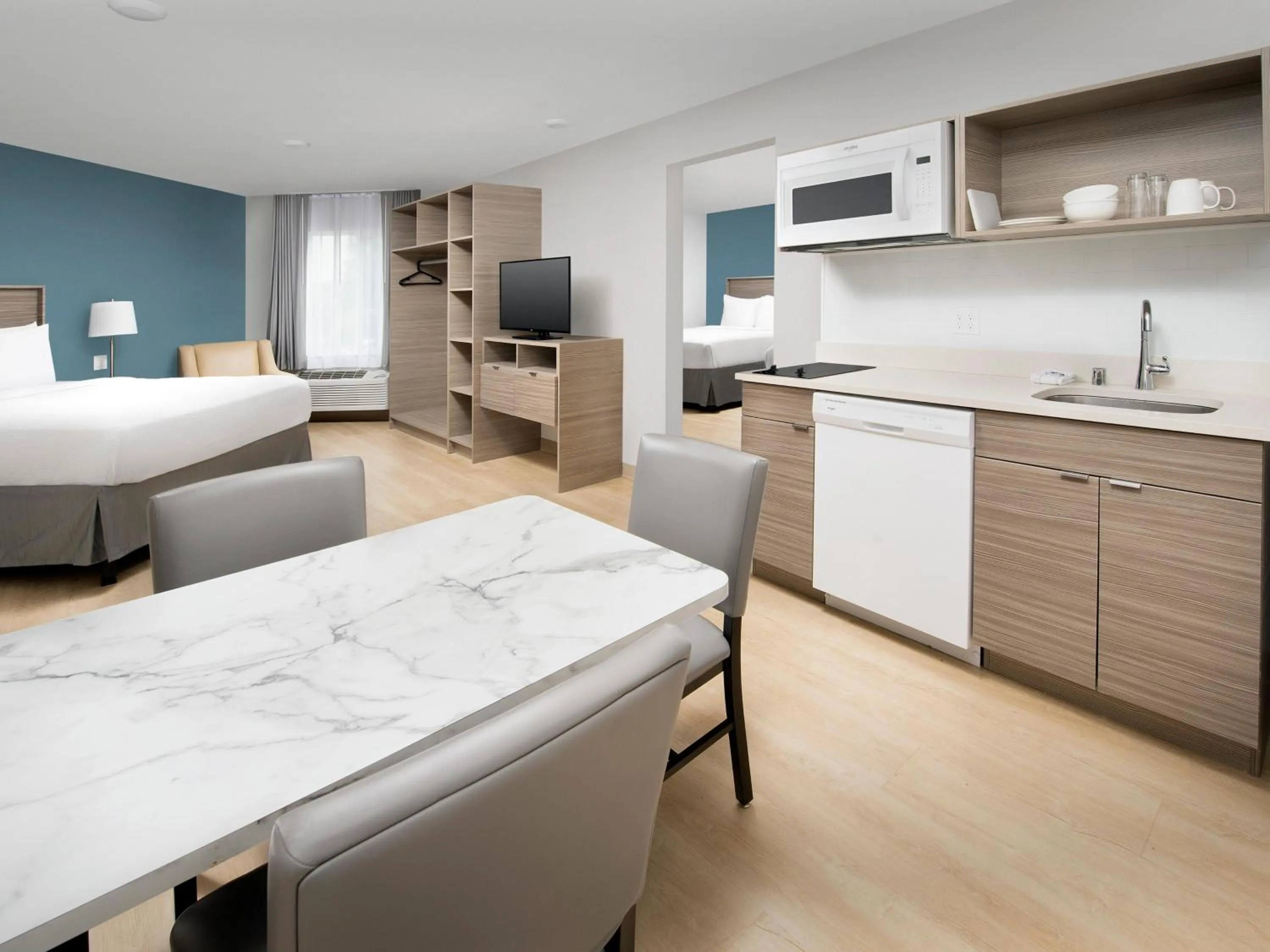 Bed in WoodSpring Suites Seattle Tukwila