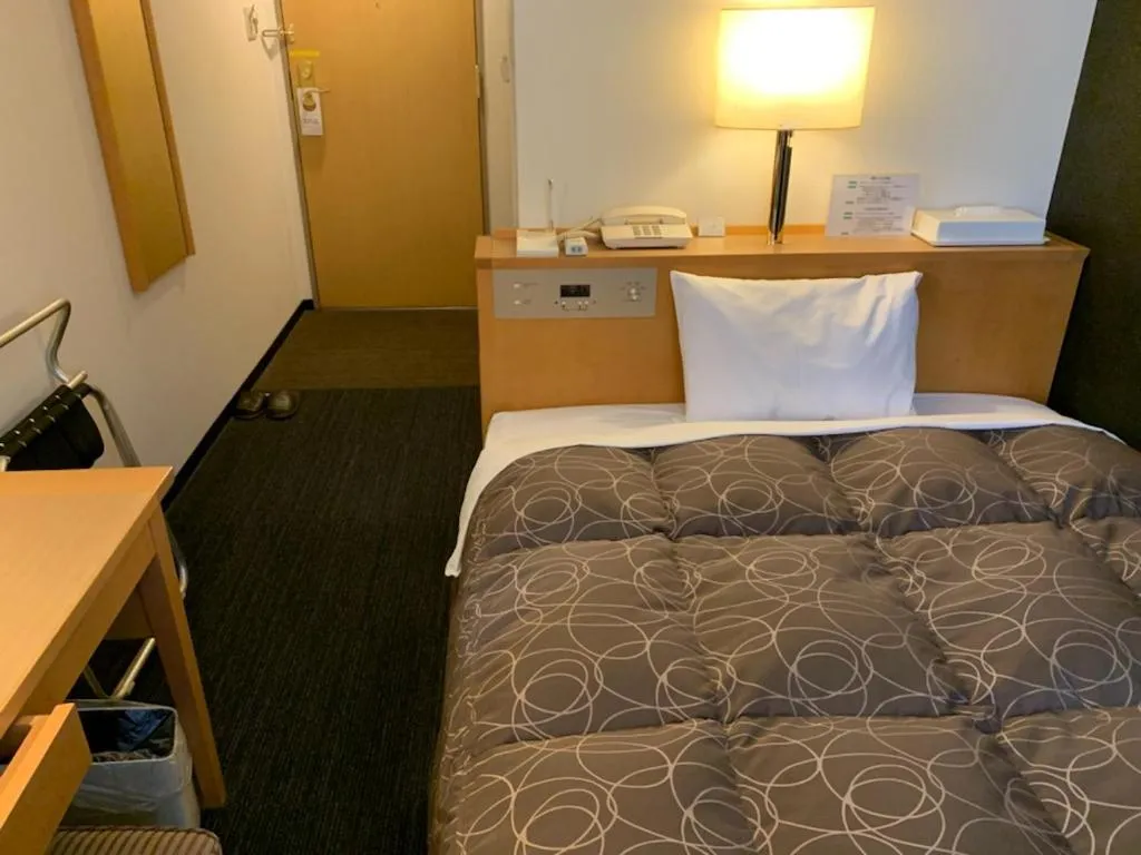 Photo of the whole room, Bed in AZ Inn Obu