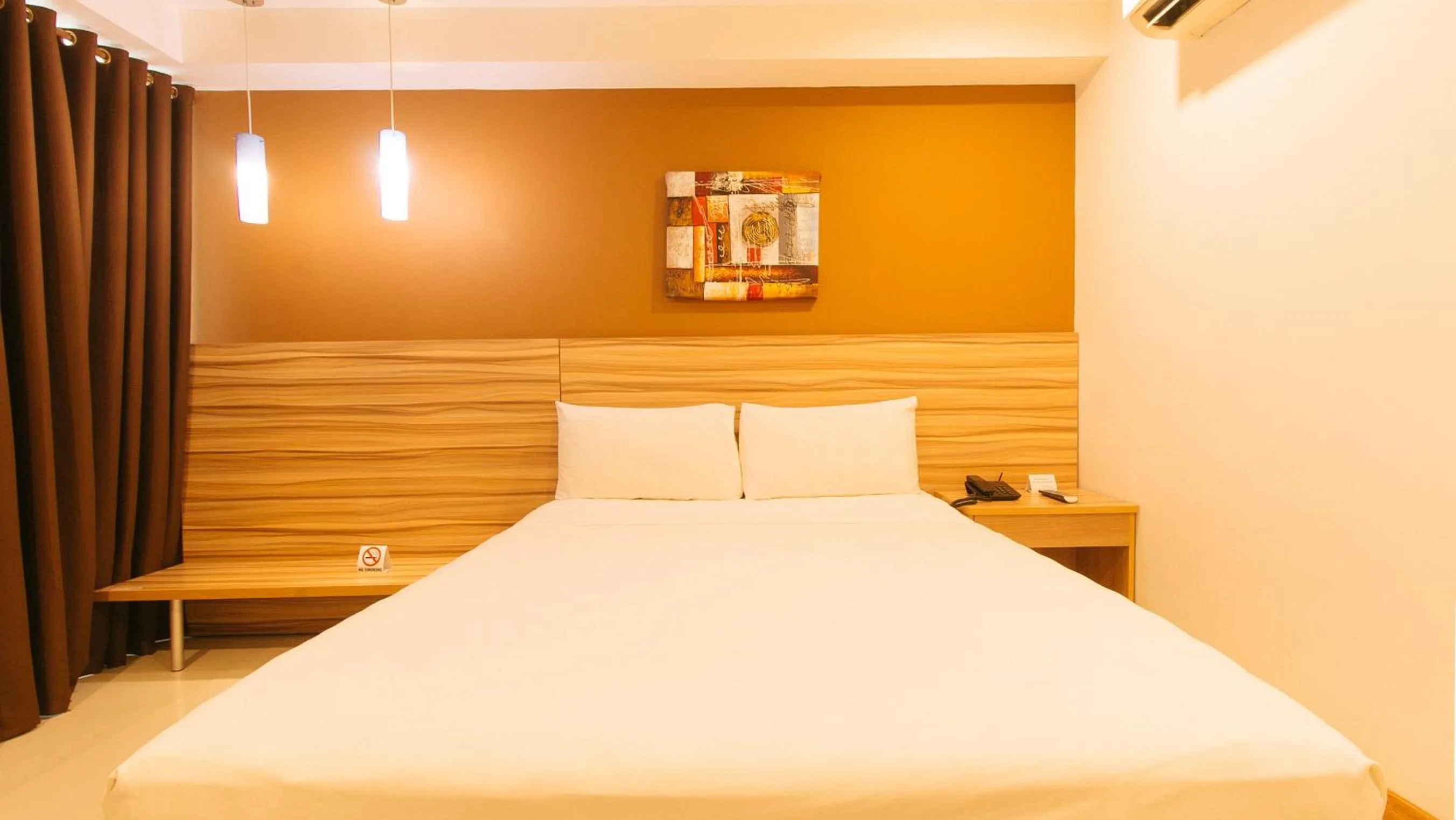 Bedroom, Bed in Guijo Suites Makati