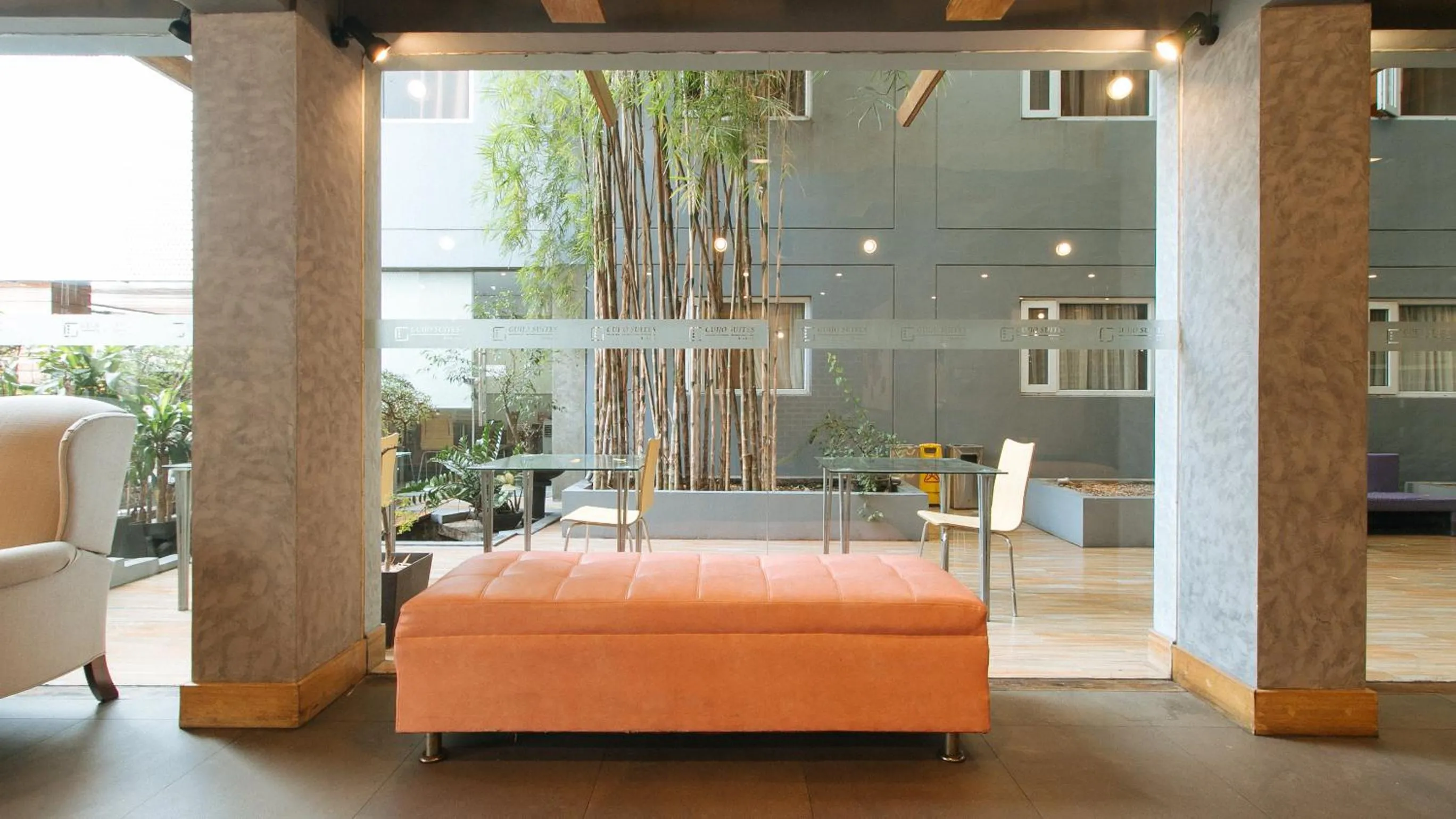 Seating area, Bed in Guijo Suites Makati