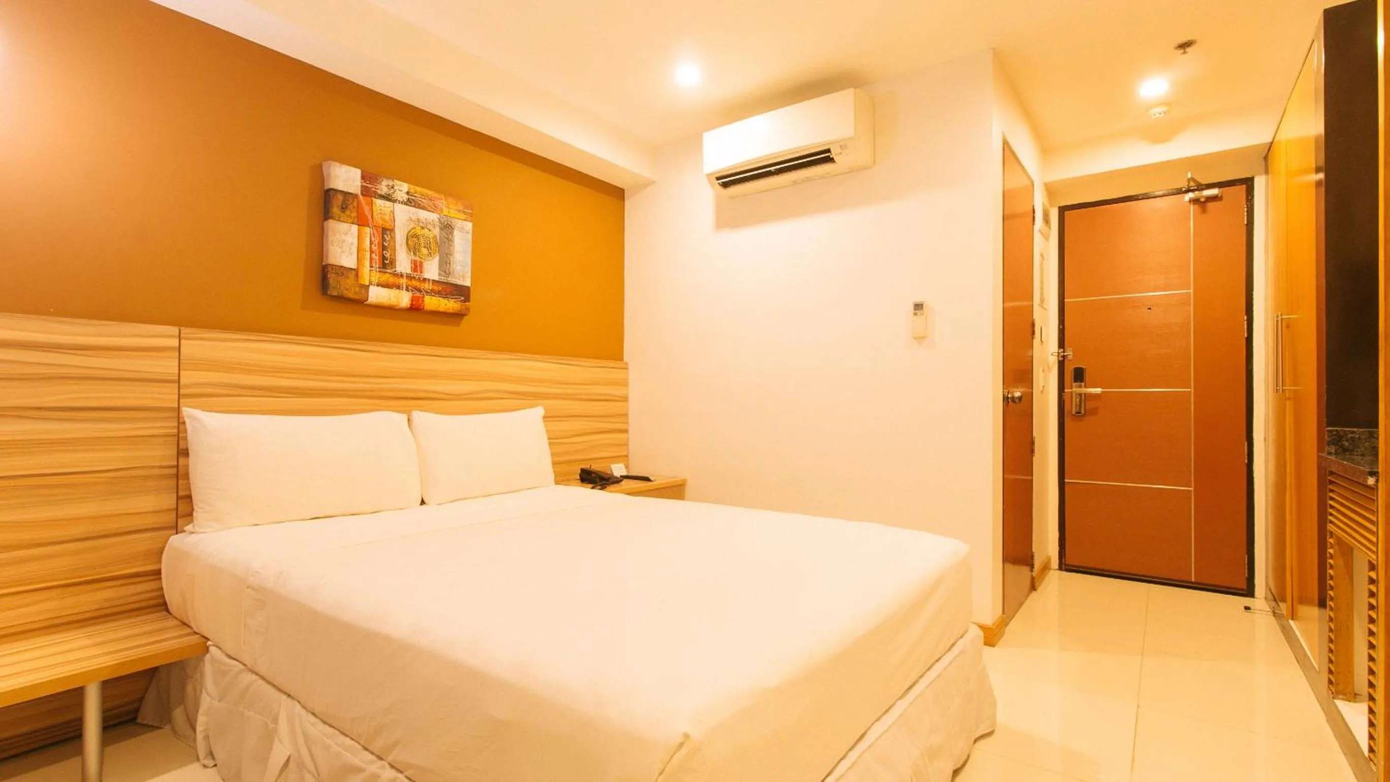 Bedroom, Bed in Guijo Suites Makati