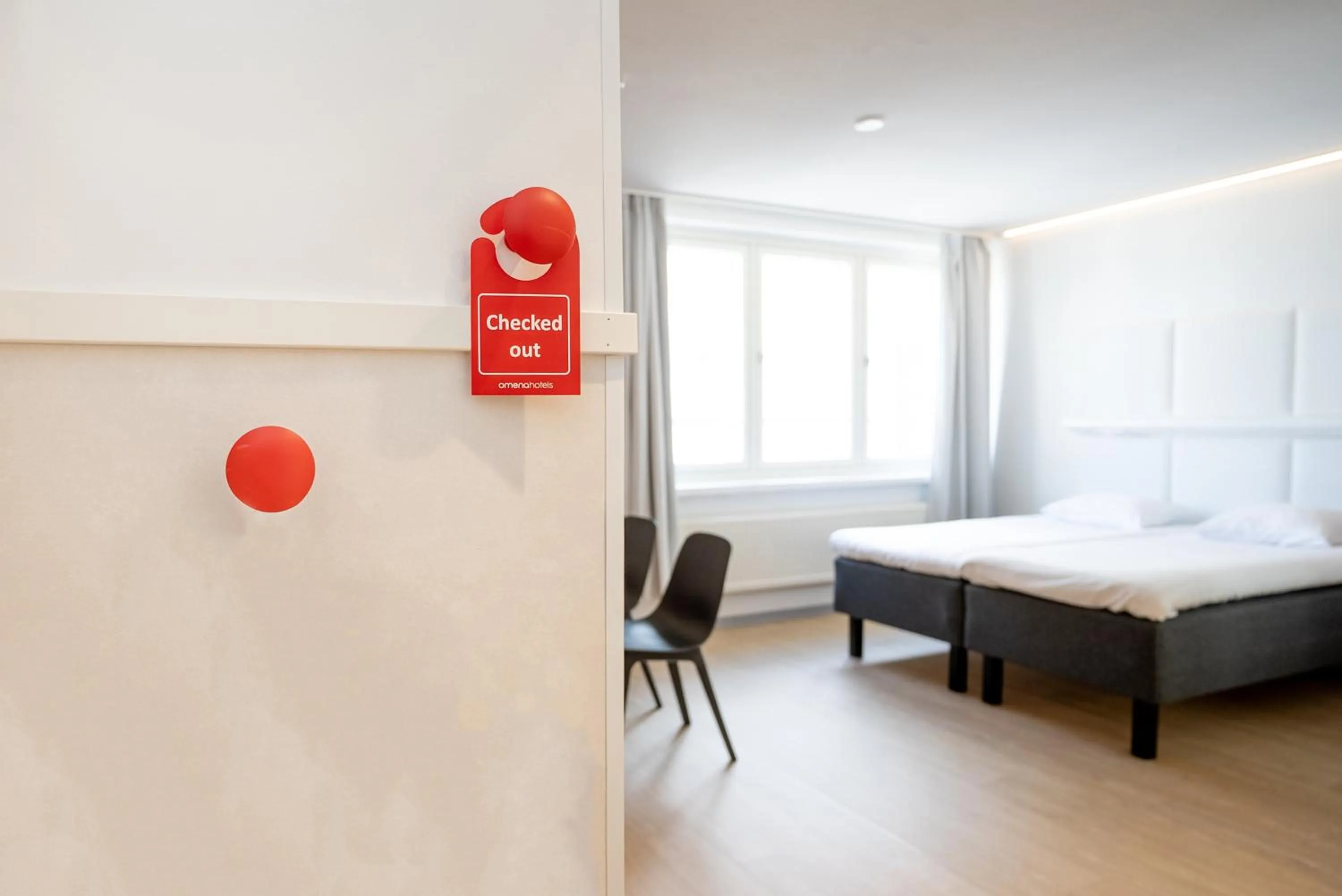 Living room, Bed in Omena Hotel Jyväskylä