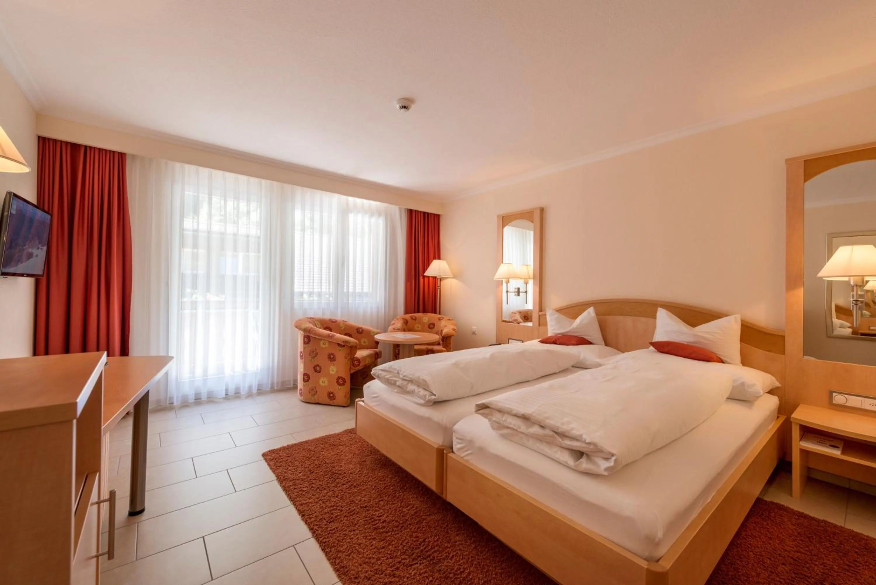 Photo of the whole room, Bed in Alpenresort Eienwäldli Engelberg