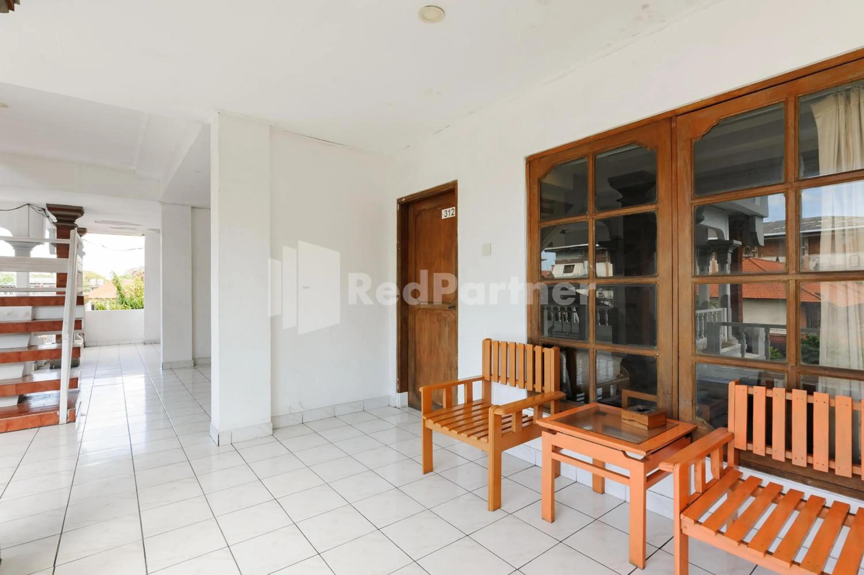 Seating area in Pulau Bali Hotel Denpasar RedPartner