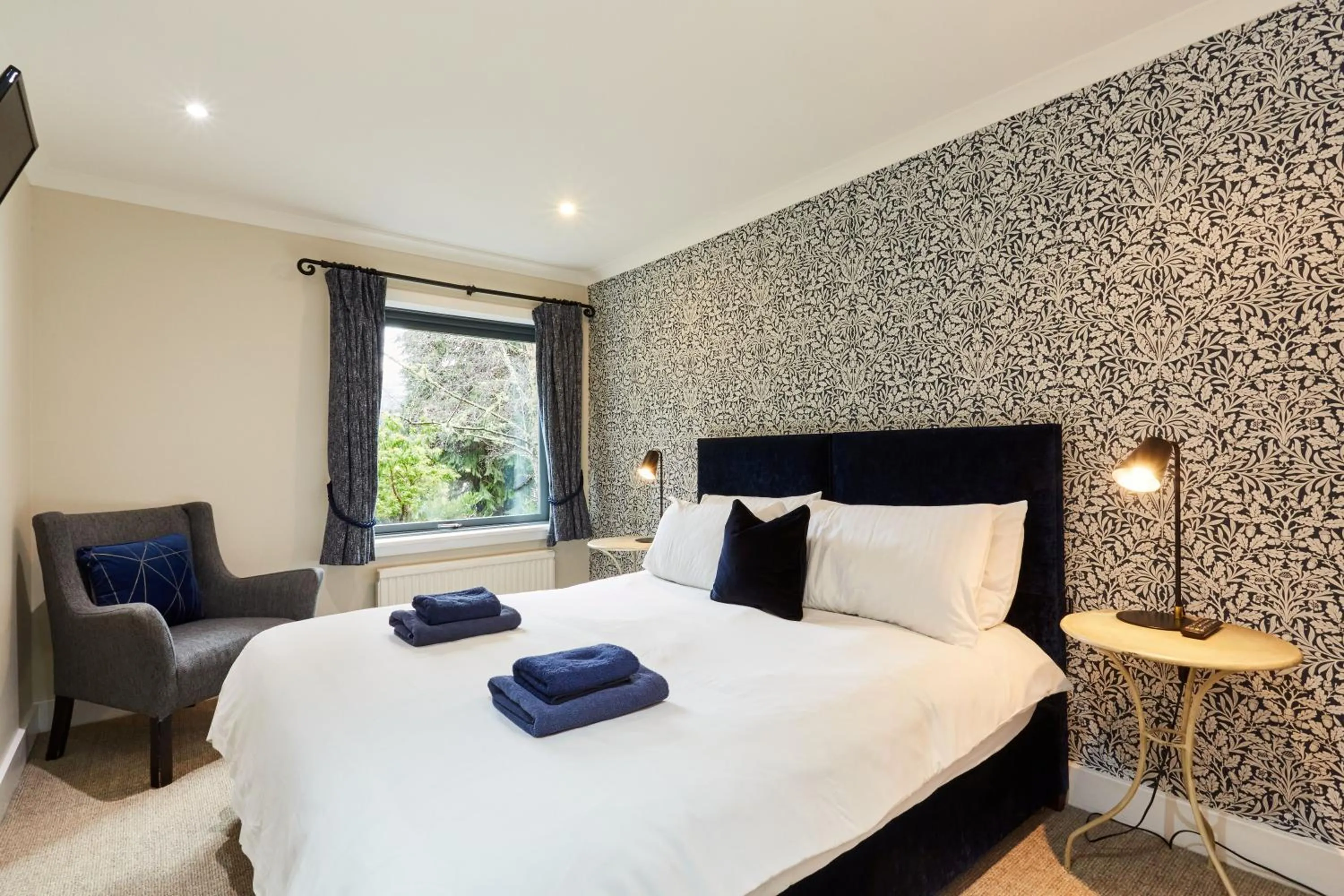 Bedroom, Bed in LOCH TAY HIGHLAND LODGES and GLAMPING PARK