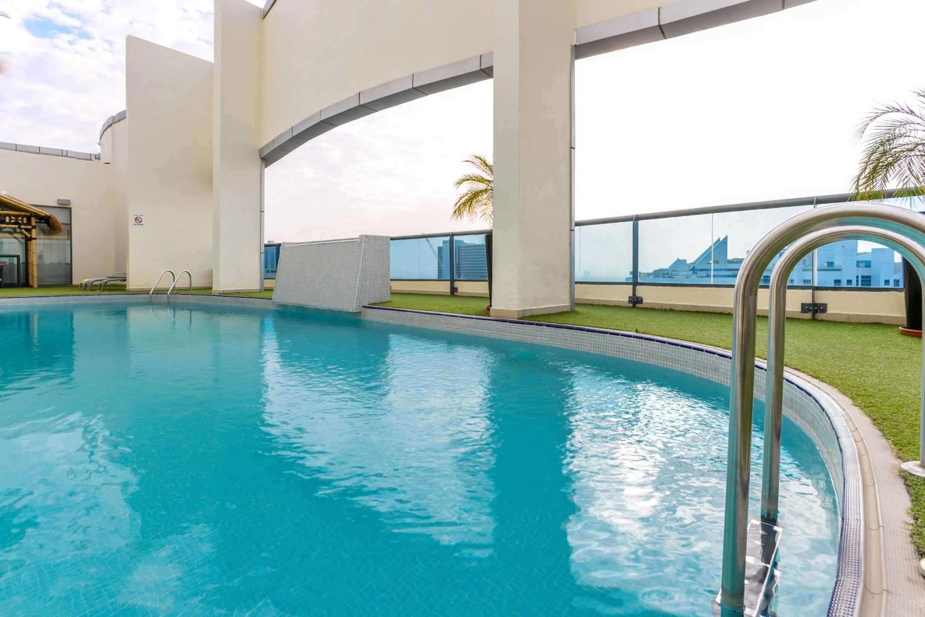 Swimming pool in First Central Hotel Suites