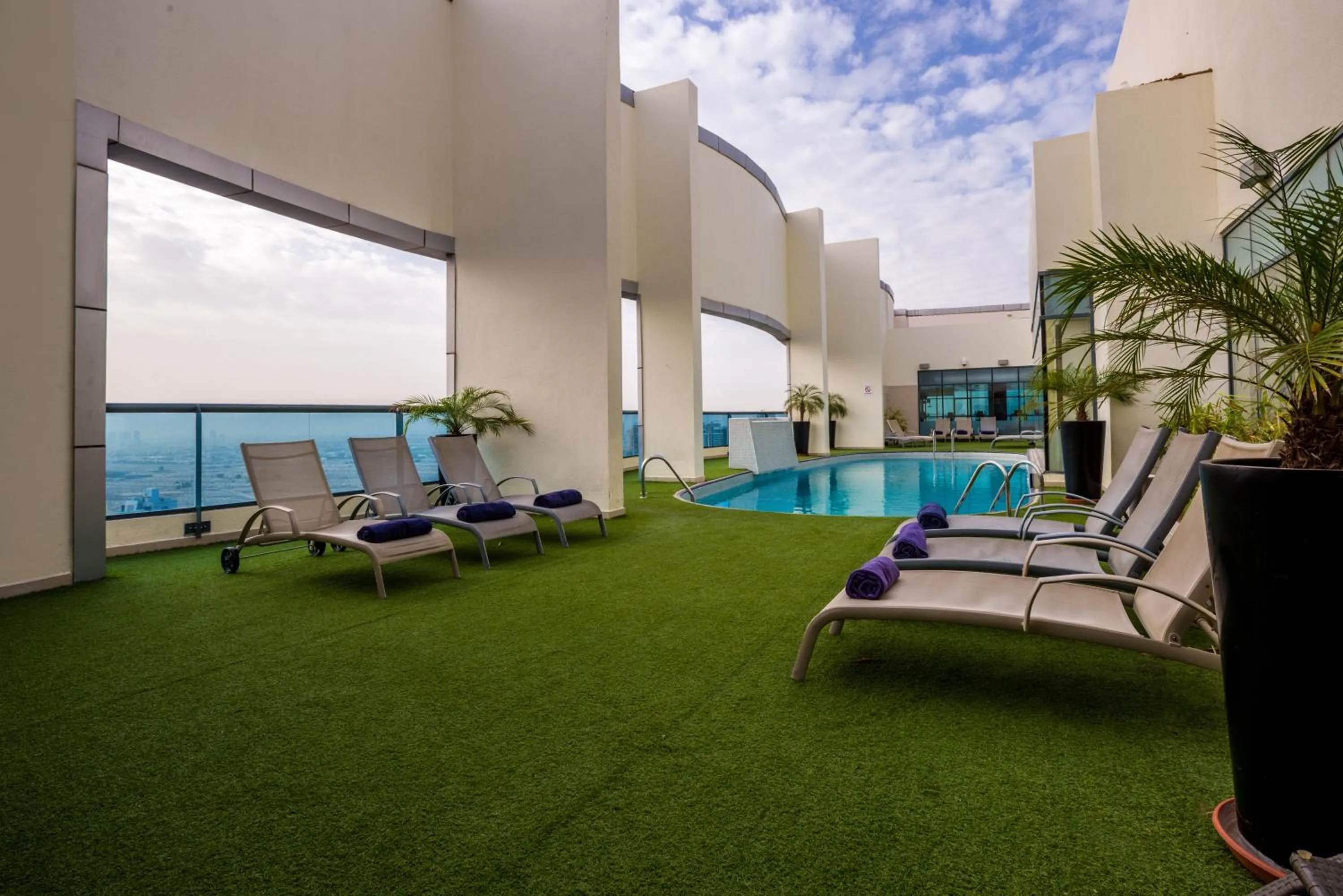 Swimming pool in First Central Hotel Suites