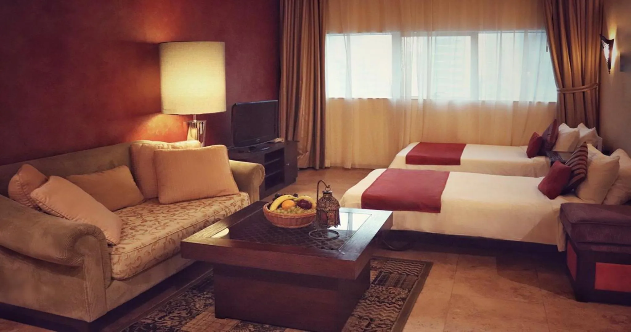 Bed in First Central Hotel Suites