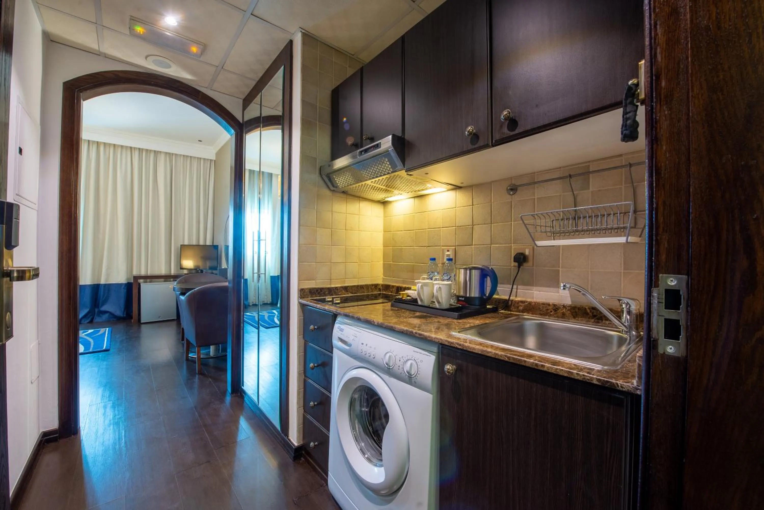 Kitchen or kitchenette in First Central Hotel Suites