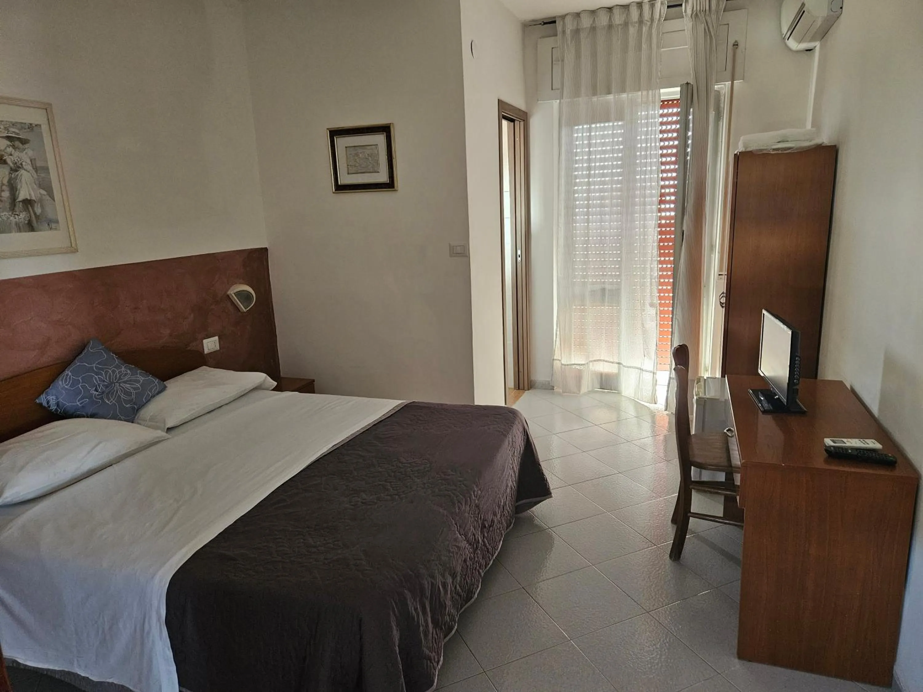 Bed in Hotel Souvenir