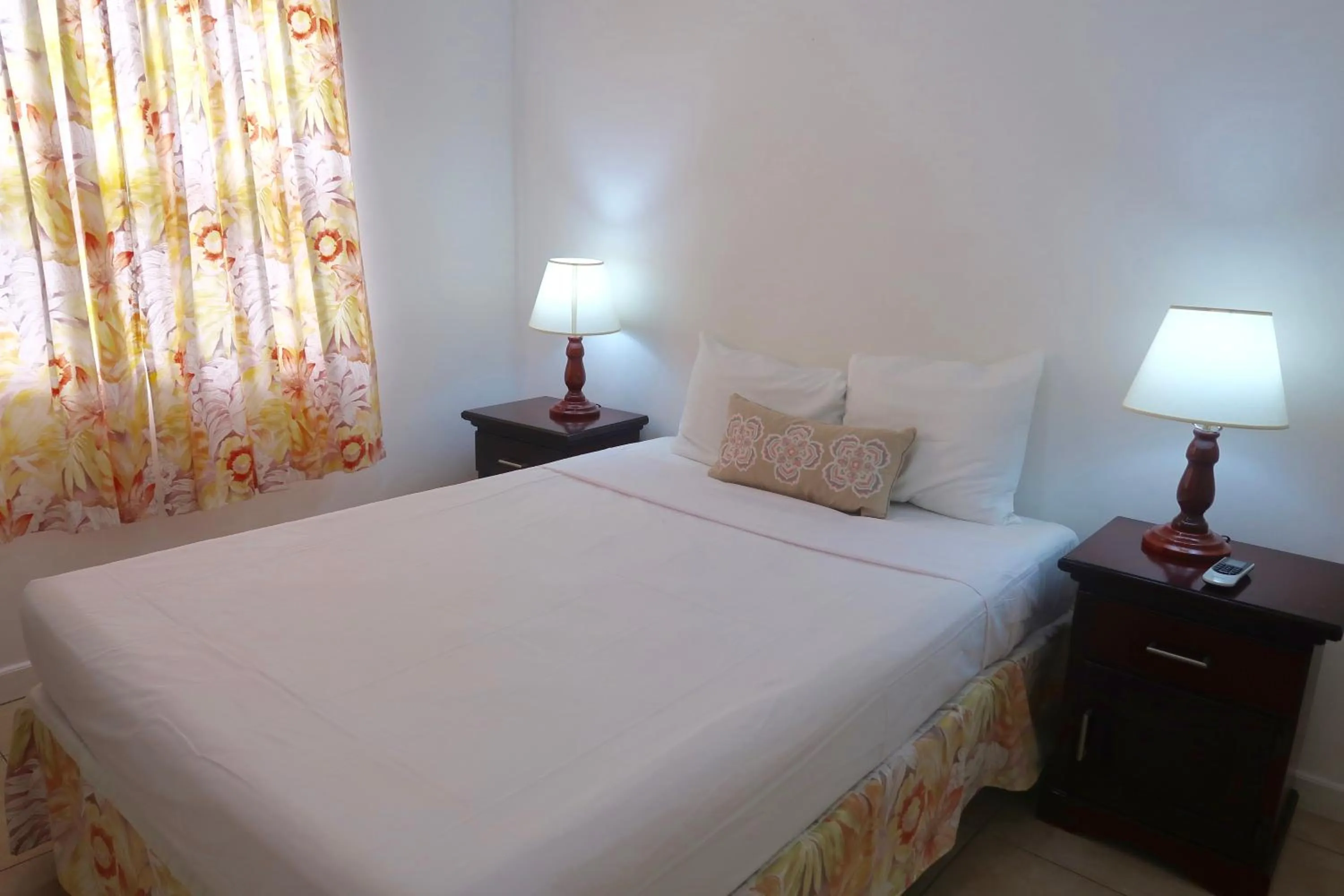 Bed in Adulo Apartments