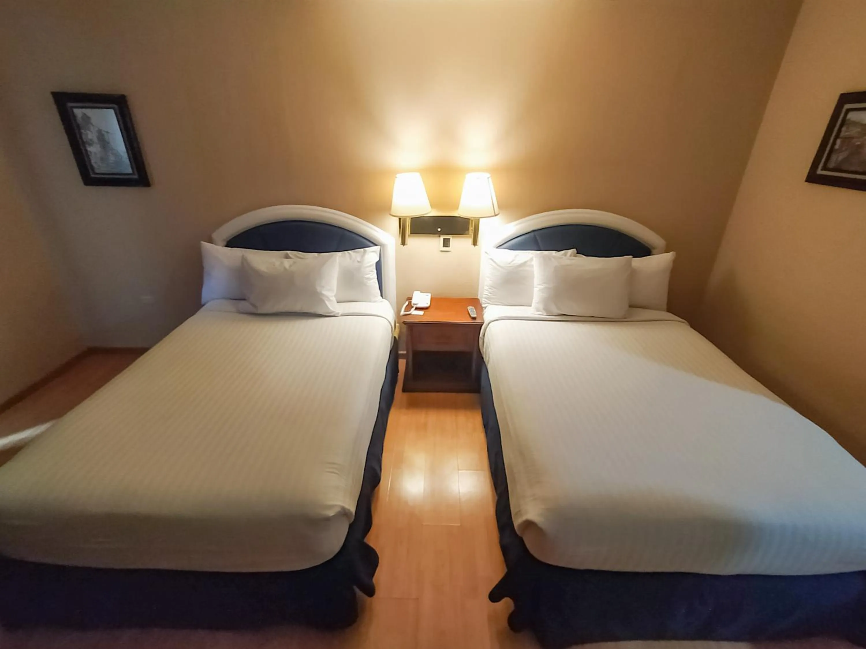 Bed in Hotel Gran Plaza & Convention Center