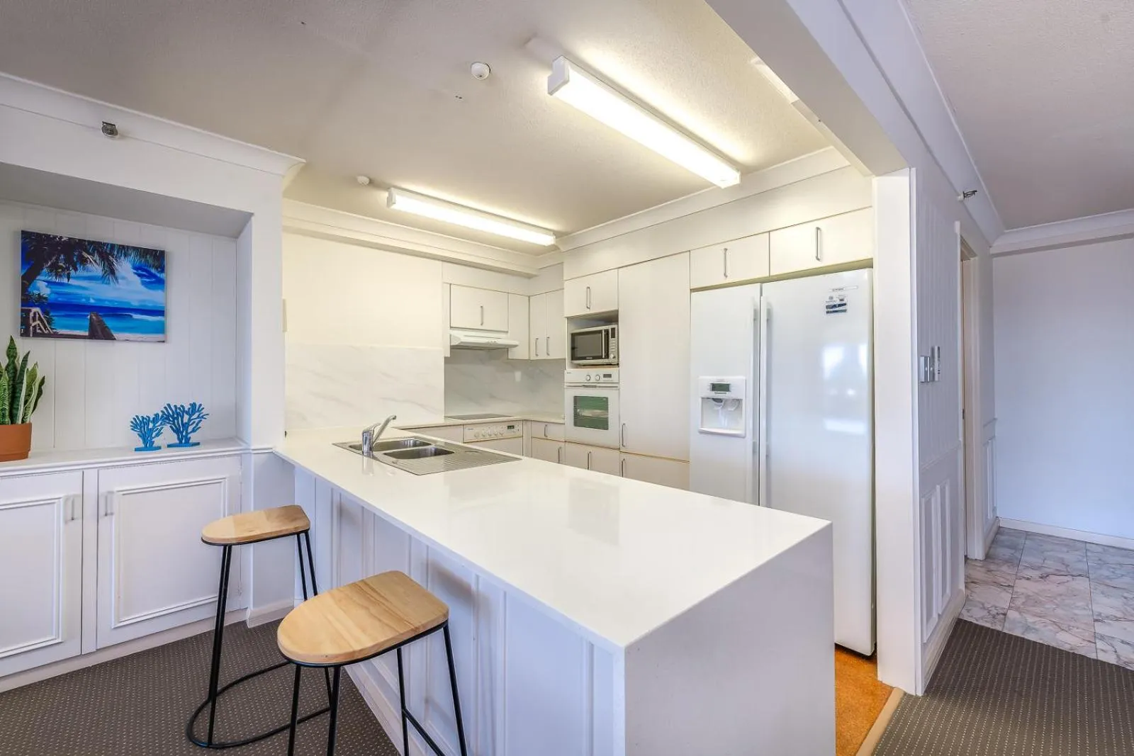 Kitchen or kitchenette in Victoria Square Apartments