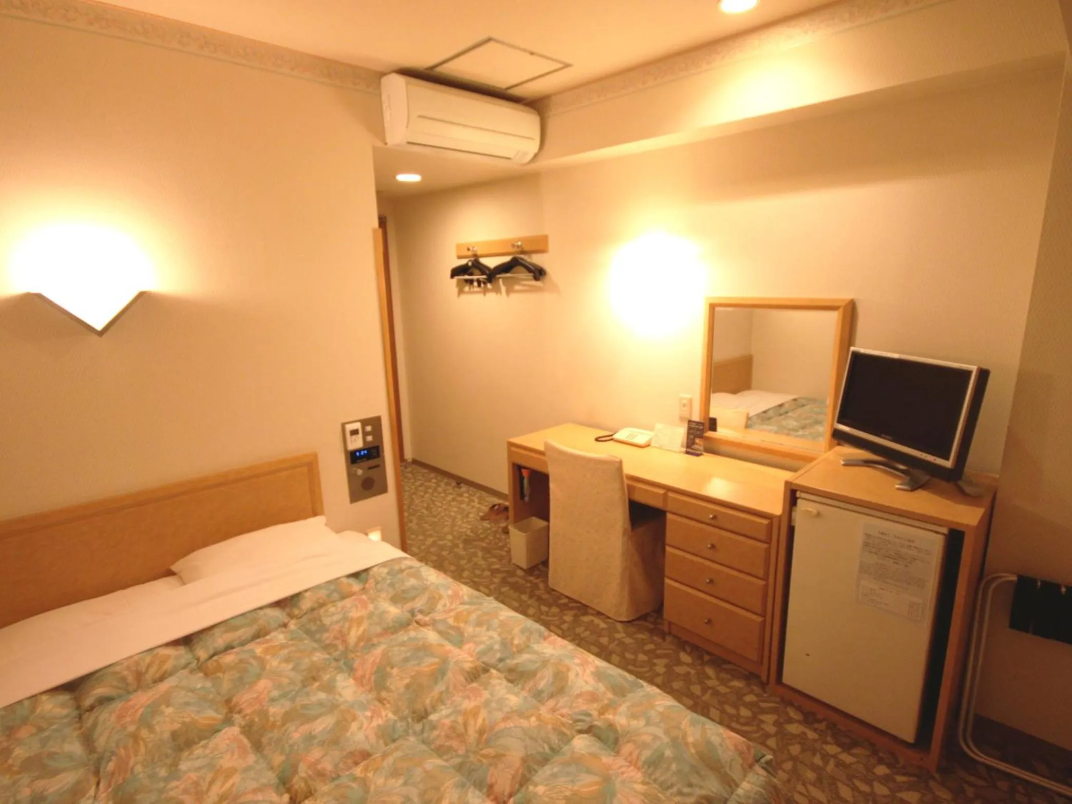 Bed in Rako Hananoi Hotel