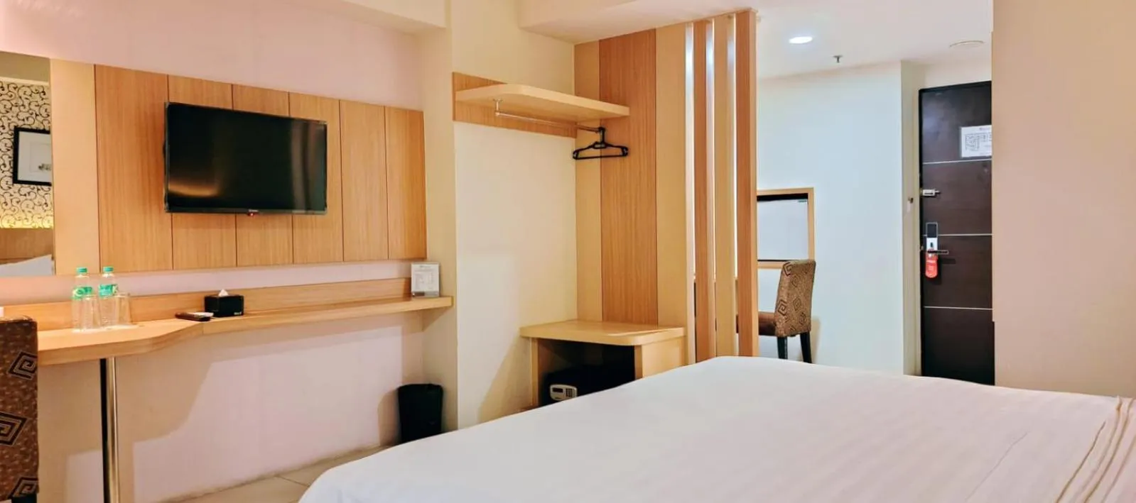 Bed in The Square Surabaya Hotel