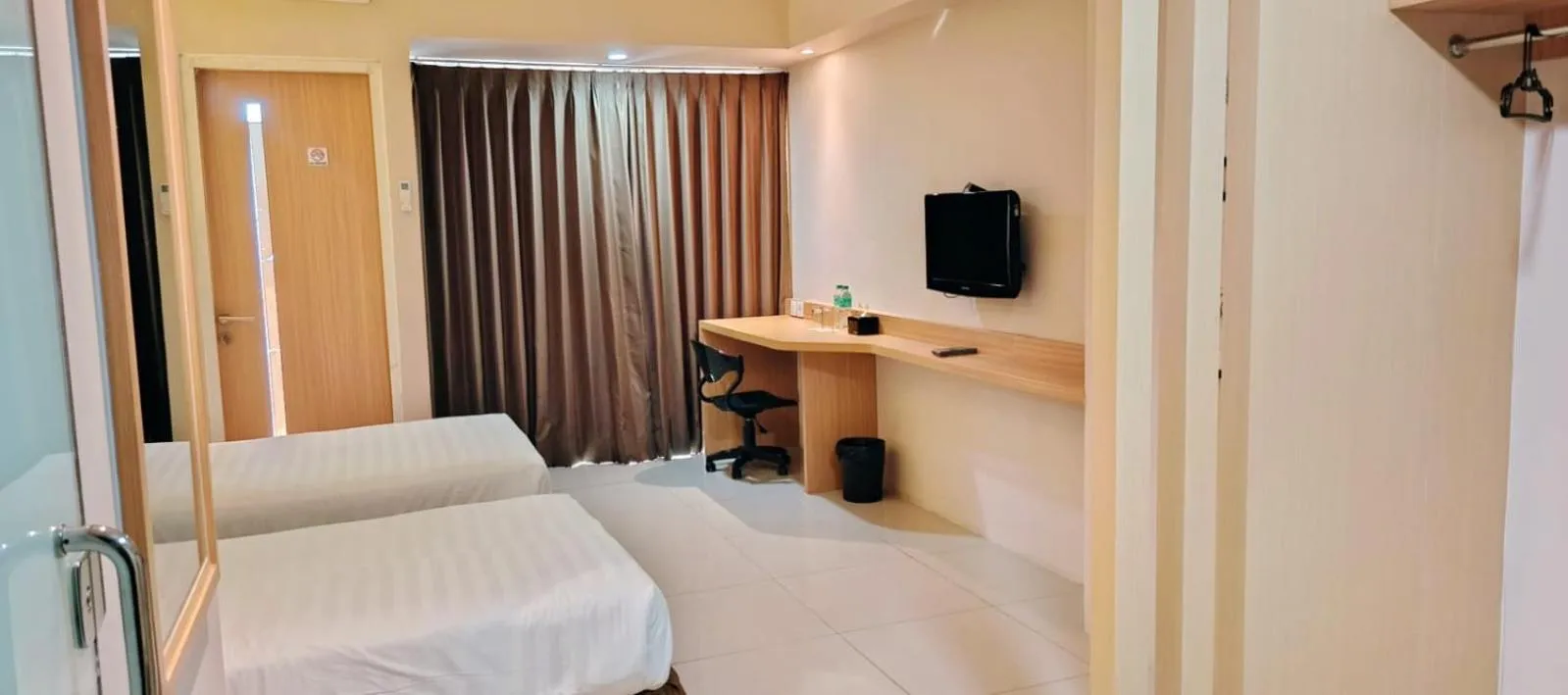 Bed in The Square Surabaya Hotel