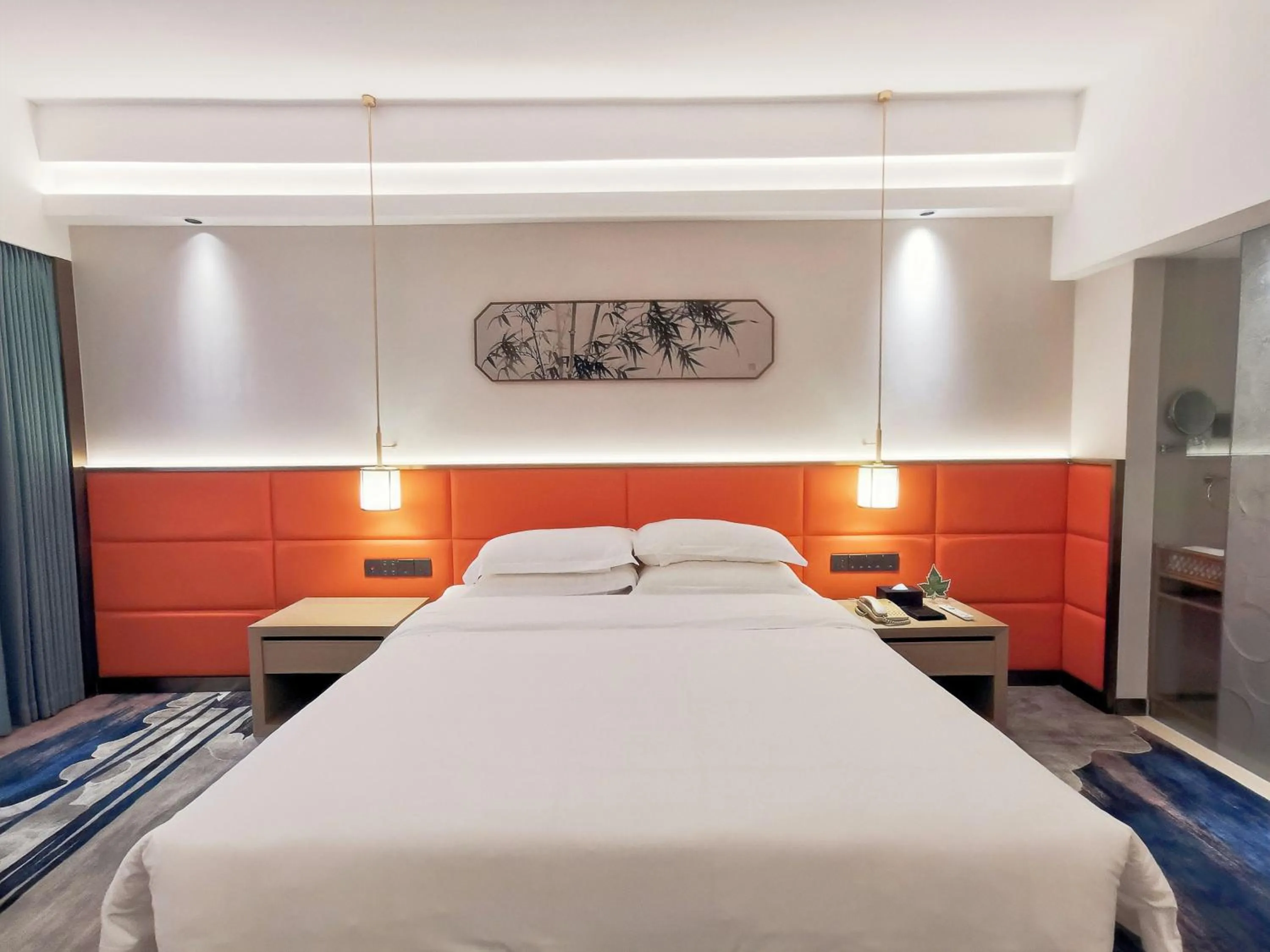 Bed in Landmark International Hotel