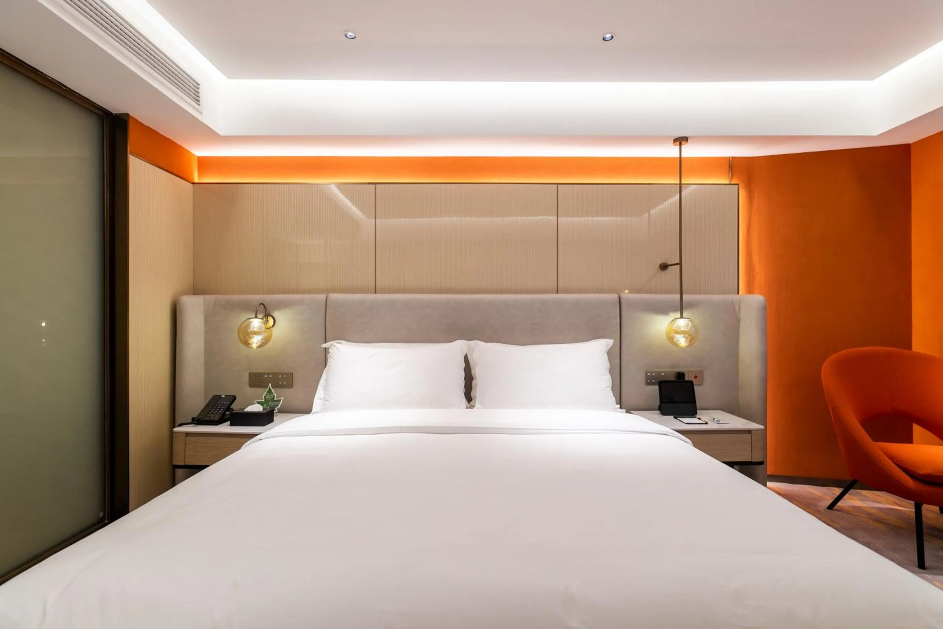 Bed in Landmark International Hotel