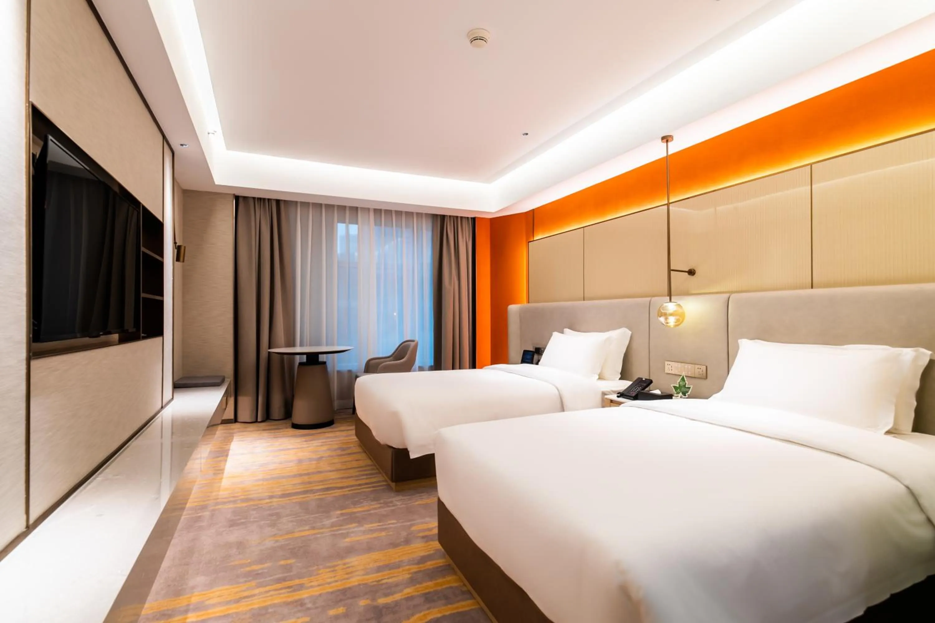 Bed in Landmark International Hotel