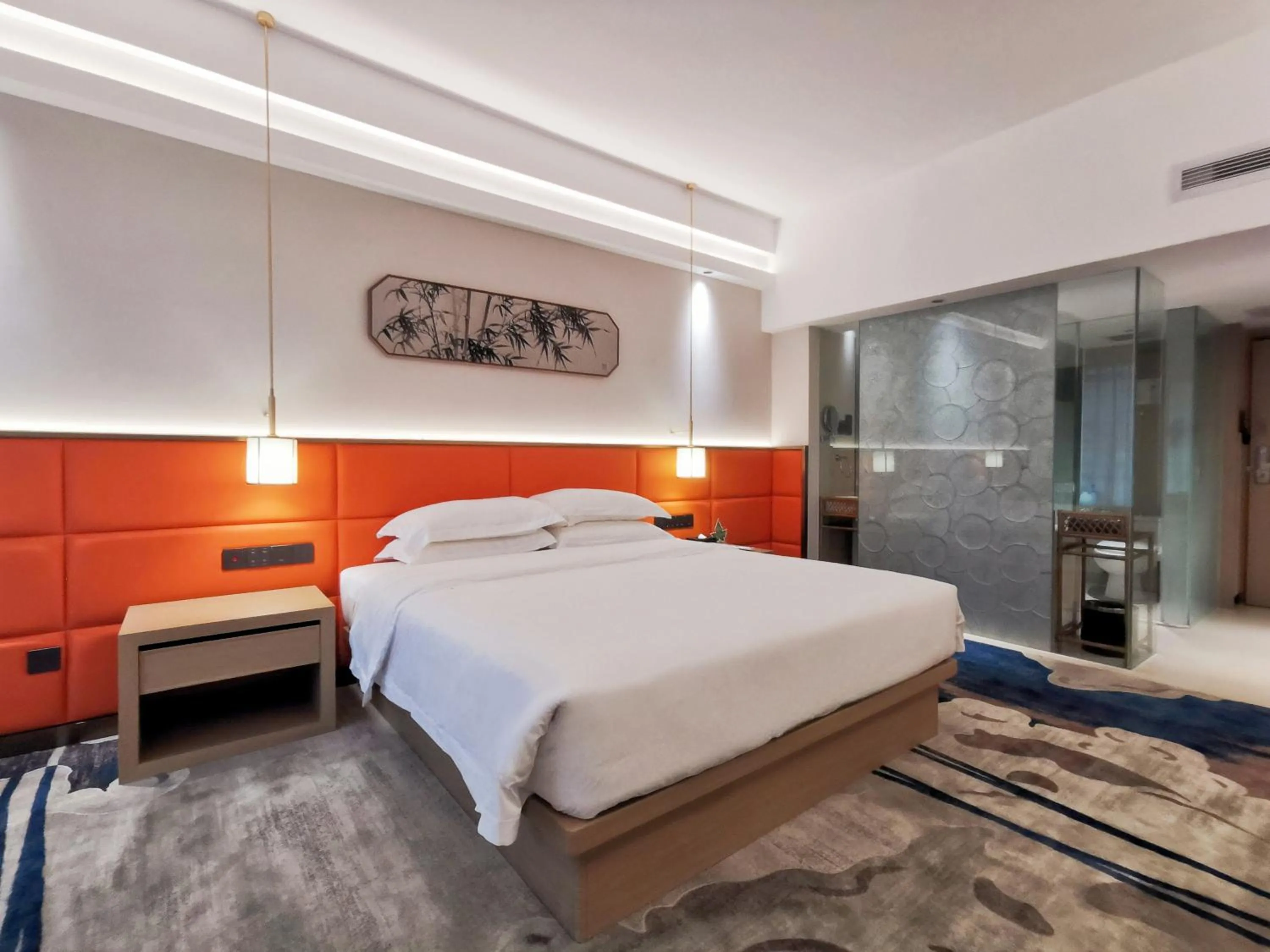 Bed in Landmark International Hotel