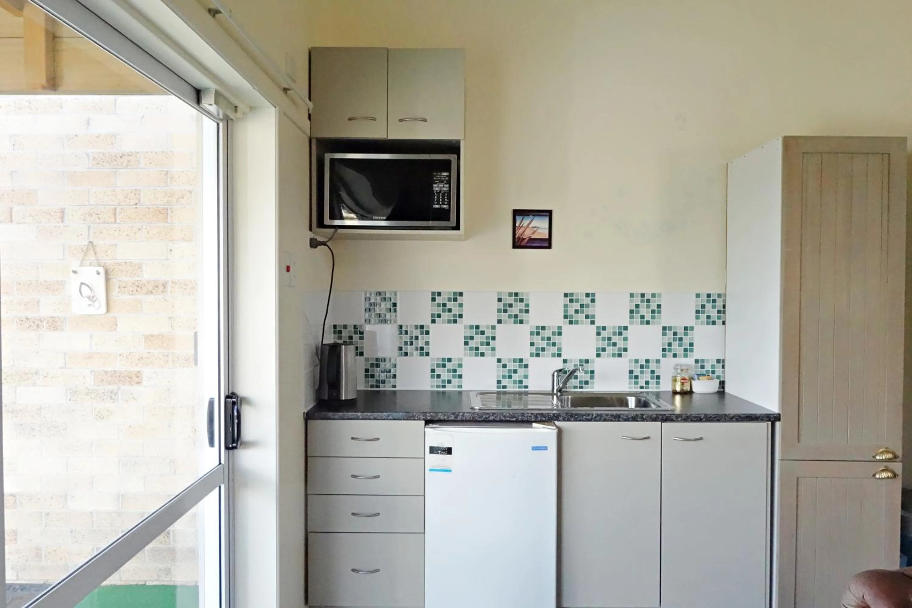 Kitchen or kitchenette in Manor Views NZ