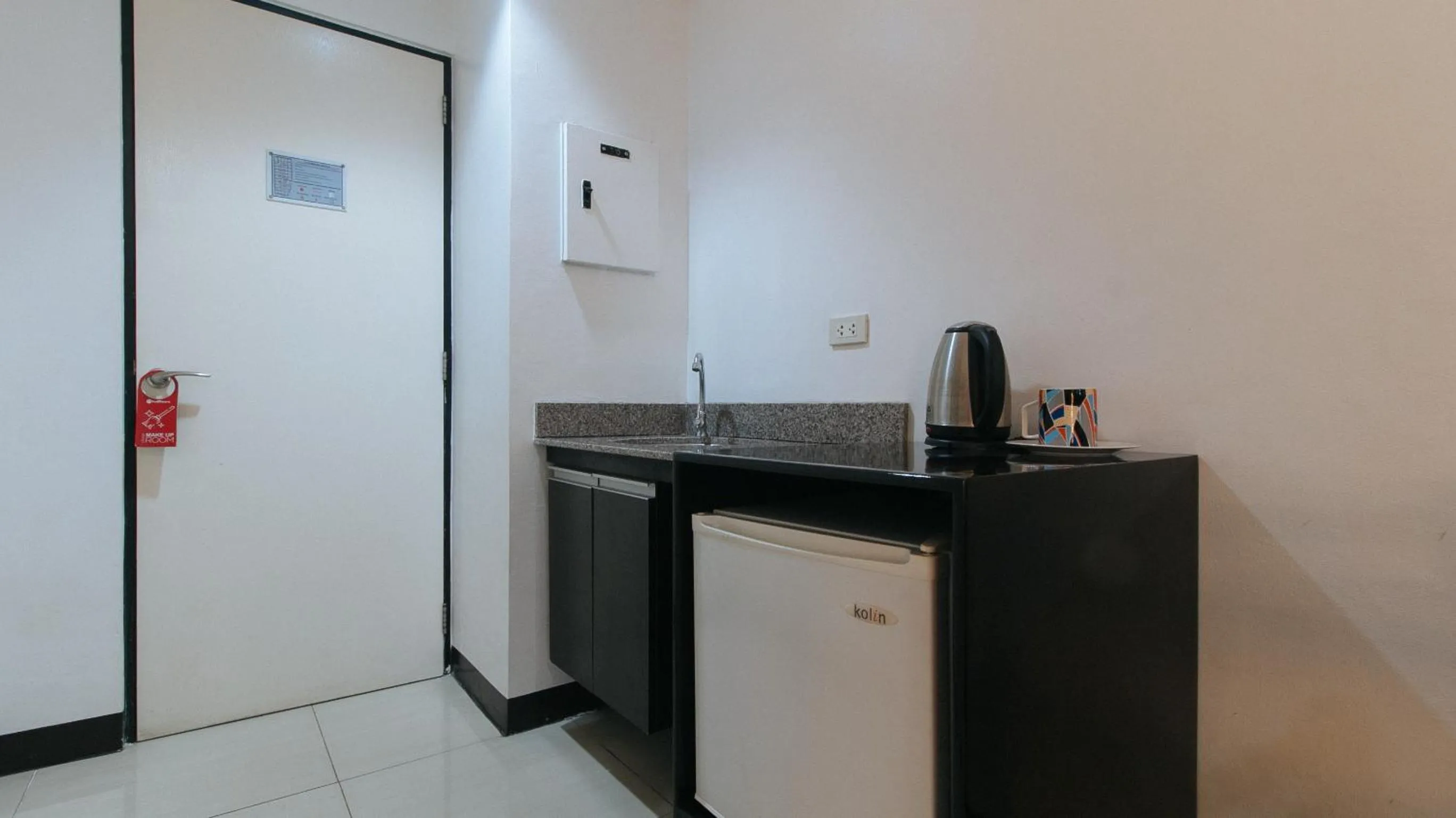 kitchen in RedDoorz Plus at Banawe Quezon City