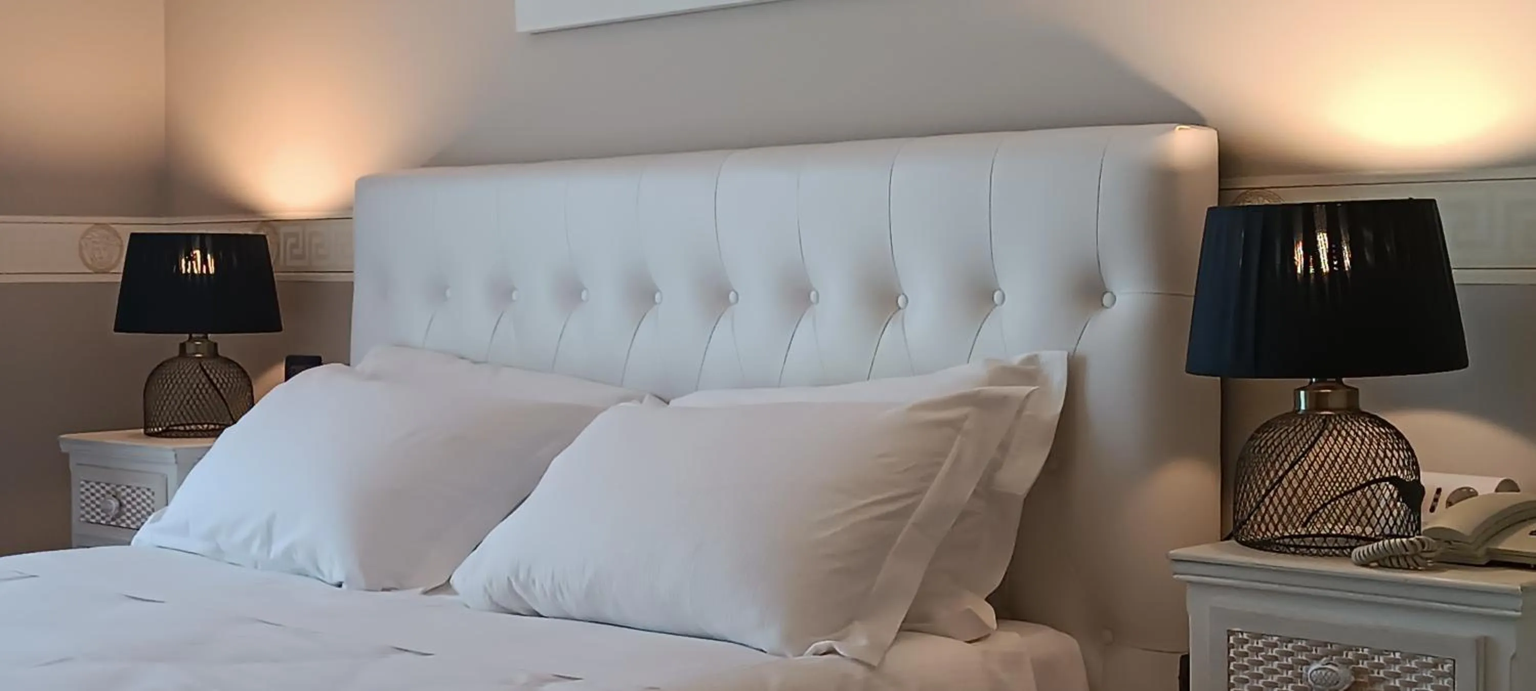 Bed in Hotel Palladium