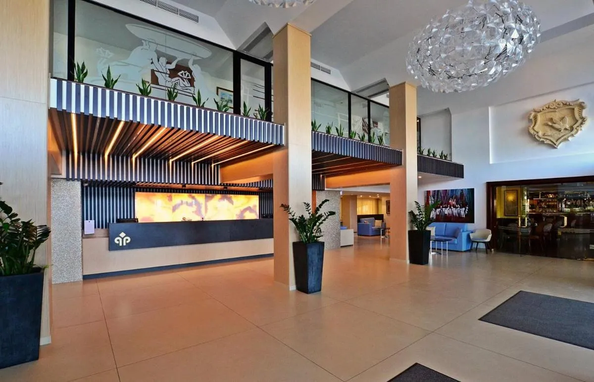 Lobby or reception in QAWRA Palace Resort & SPA
